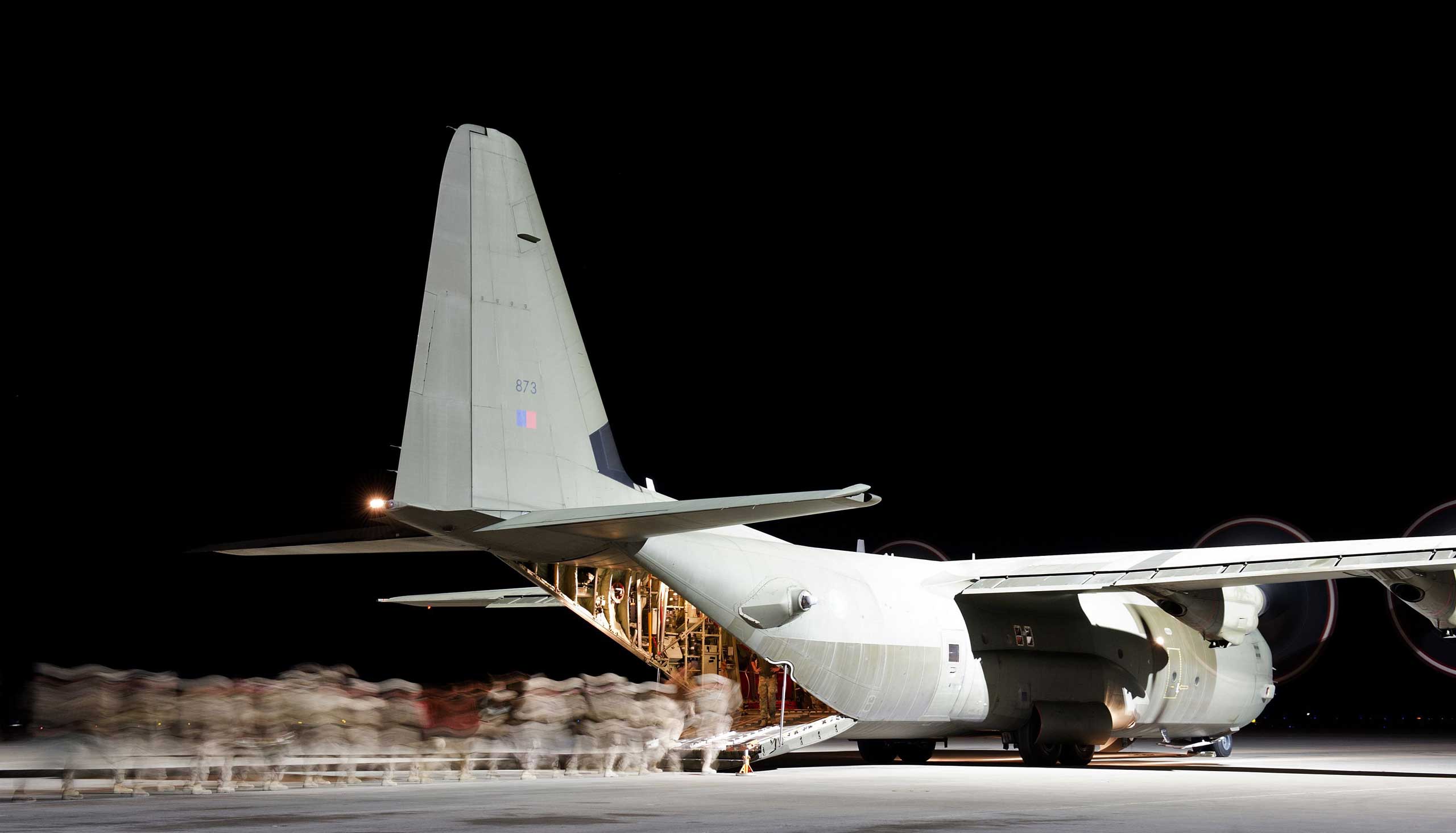 British troops are pictured leaving Camp Bastion for the final time in the back of a RAF Hercules transporter aircraft.
                              Final UK Troops Leave Helmand Province, Afghanistan, Oct 27, 2014