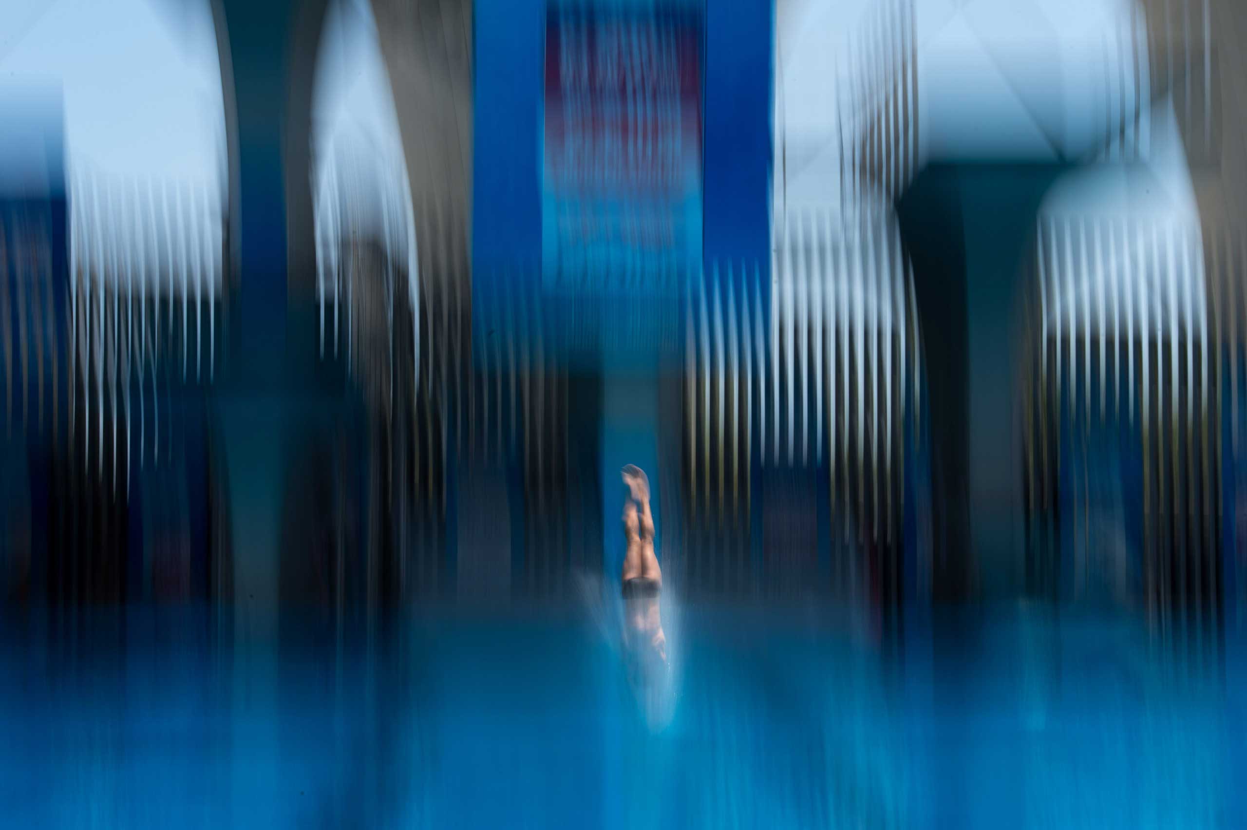 David Dinsmore of the US competes during the men's 10 metre semi-final platform event at the 19th FINA Diving World Cup in Shanghai on July 20, 2014.