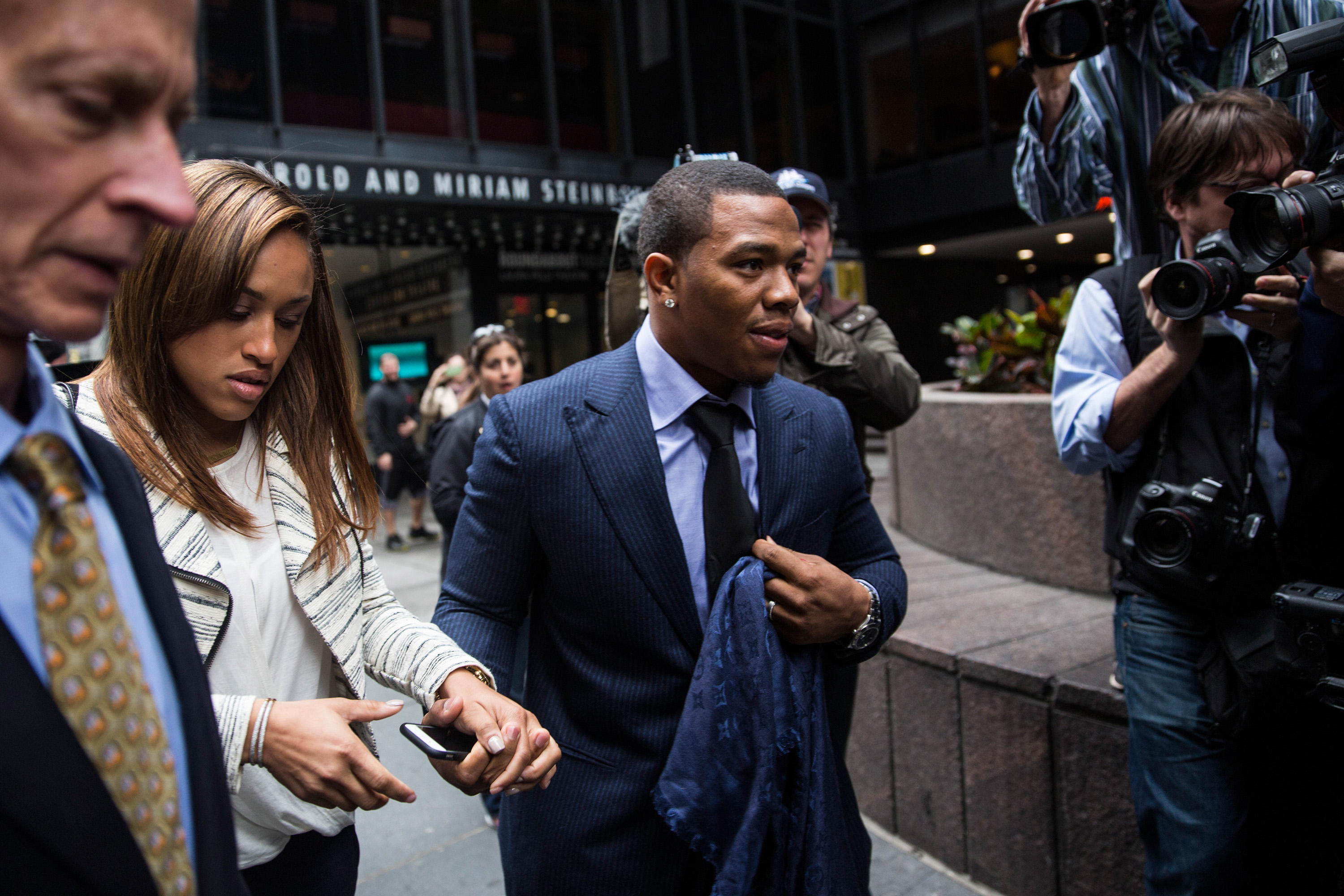Suspended Baltimore Ravens football player Ray Rice (R) and his wife Janay Palmer arrive for a hearing on November 5, 2014 in New York City. (Andrew Burton&mdash;Getty Images)