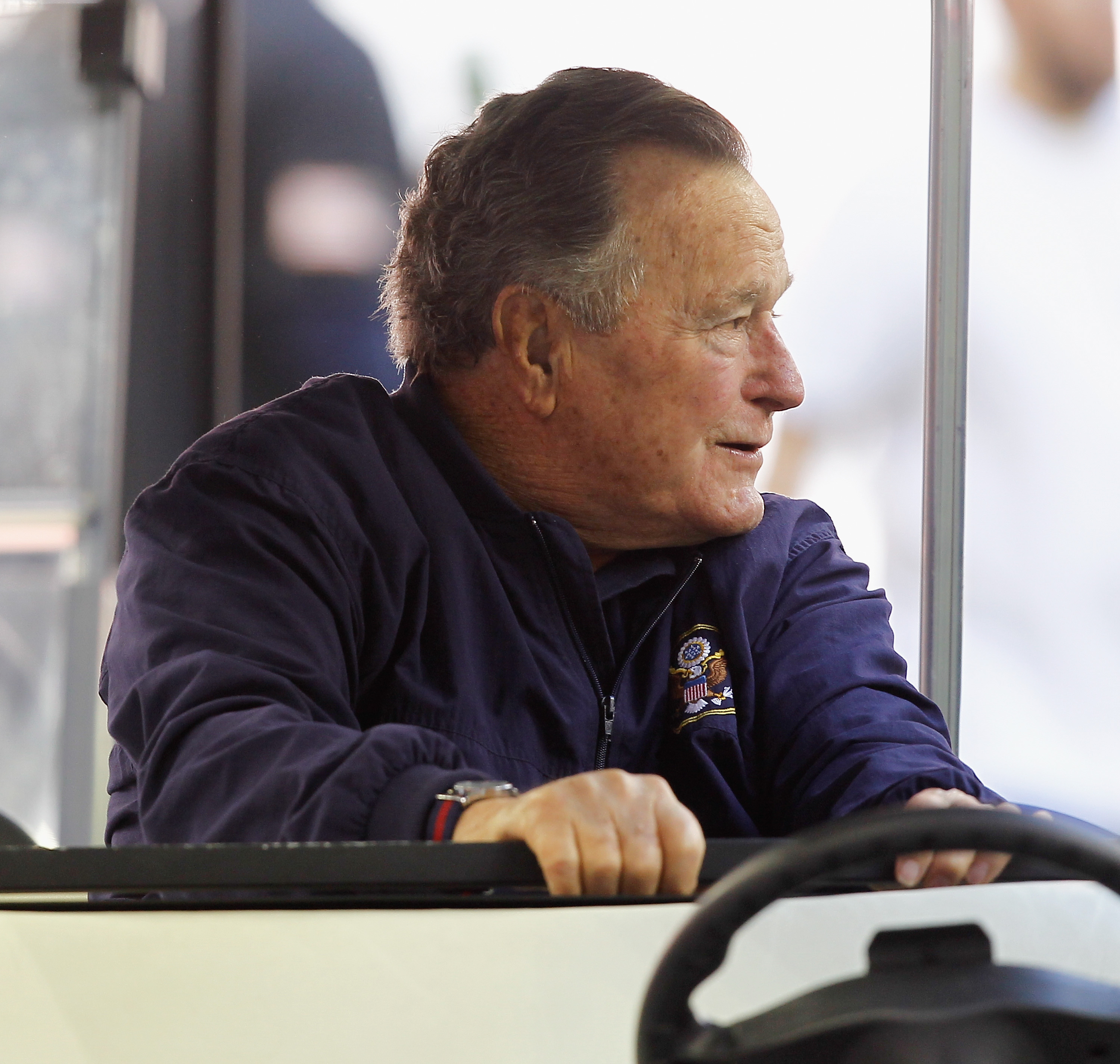 Former President George H.W. Bush attends a game between the Cincinnati Bengals and Houston Texans at NRG Stadium on November 23, 2014 in Houston, Texas. (Bob Levey—Getty Images)