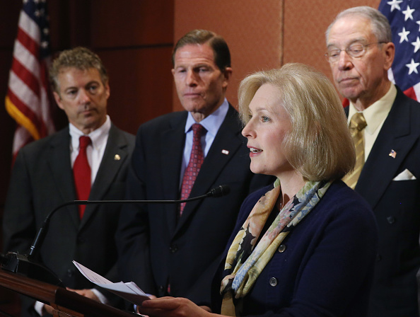 U.S. Sen. Kirsten Gillibrand (D-NY) (2nd R) speaks during a news conference on changing the military justice system, as U.S. Sen. Rand Paul (R-KY) (L), U.S. Sen. Richard Blumenthal (D-CT) (2ndL) and U.S. Sen. Chuck Grassley (R-IA) (R) listen December 2, 2014 in Washington, DC. (Mark Wilson — Getty Images)