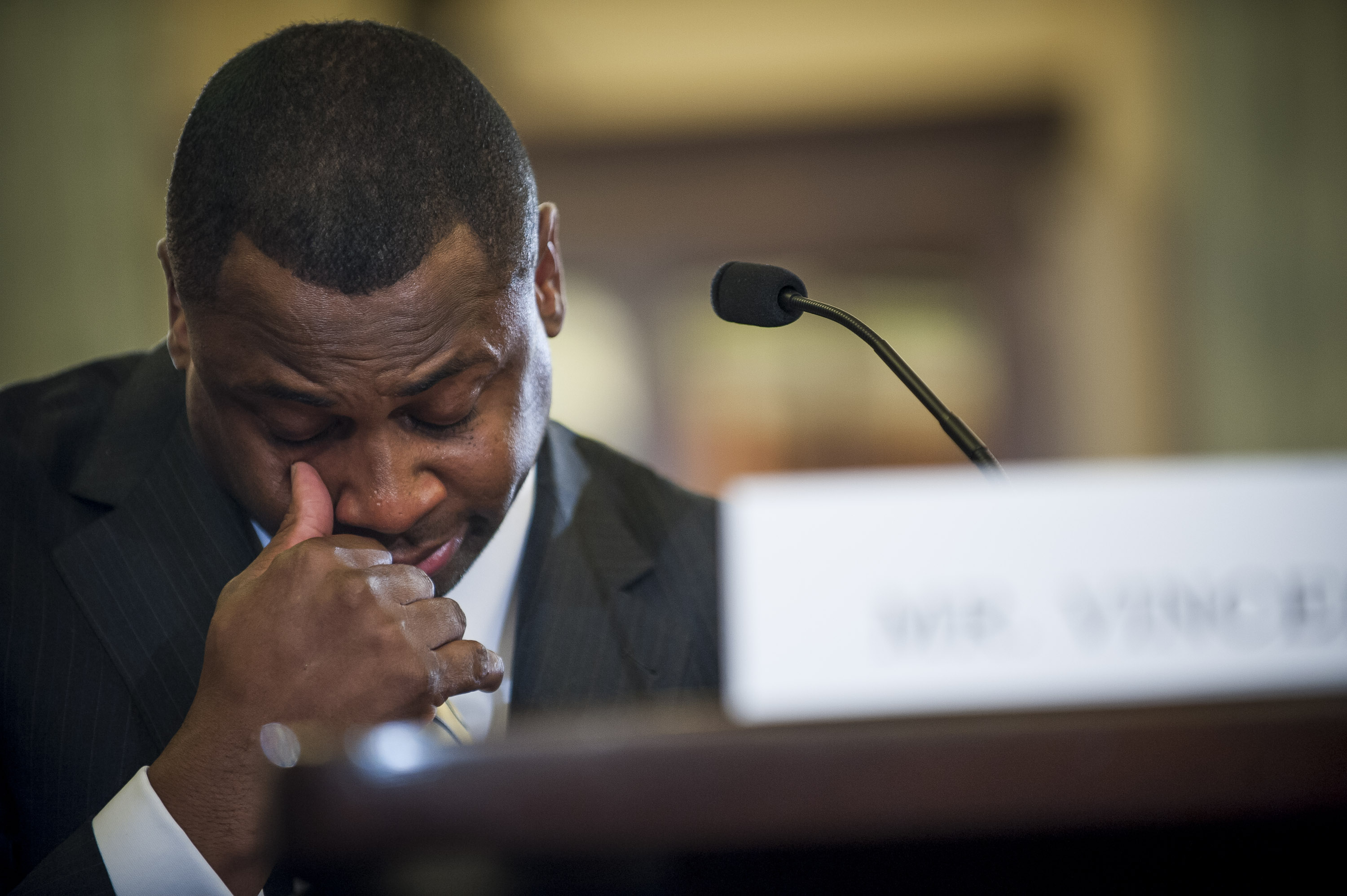 Troy Vincent, executive vice president of football operations for the National Football League becomes emotional while making his opening statement before the Senate Commerce, Science and Transportation Committee on Capitol Hill on December 2, 2014 in Washington, DC. (Pete Marovich&mdash;Getty Images)
