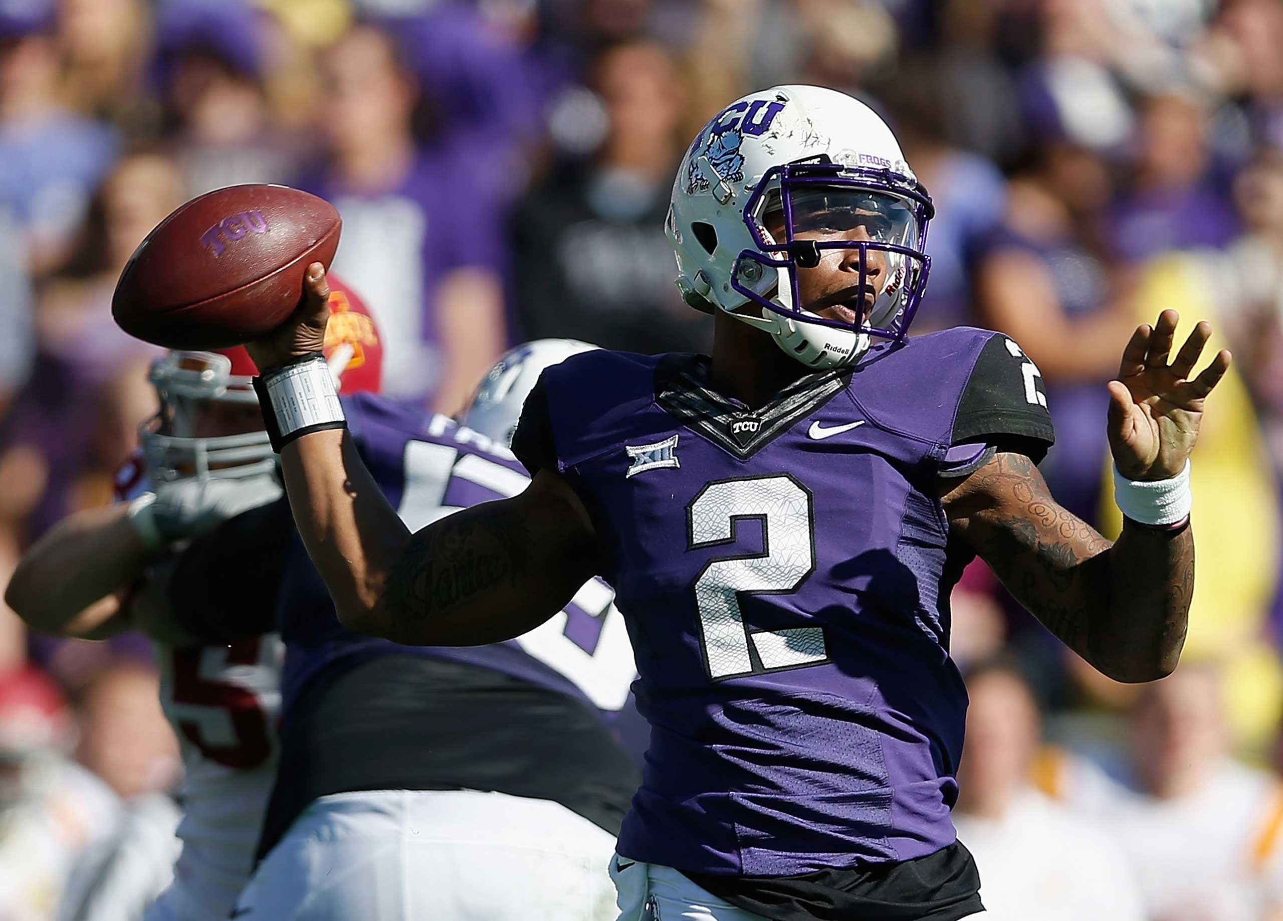 Texas Christian University Quarterback Trevone Boykin throws a pass during the thrid quarter of the Big 12 college football game against the Iowa State Cyclones at Amon G. Carter Stadium on Dec. 6, 2014 in Fort Worth, Texas. (Christian Petersen—Getty Images)