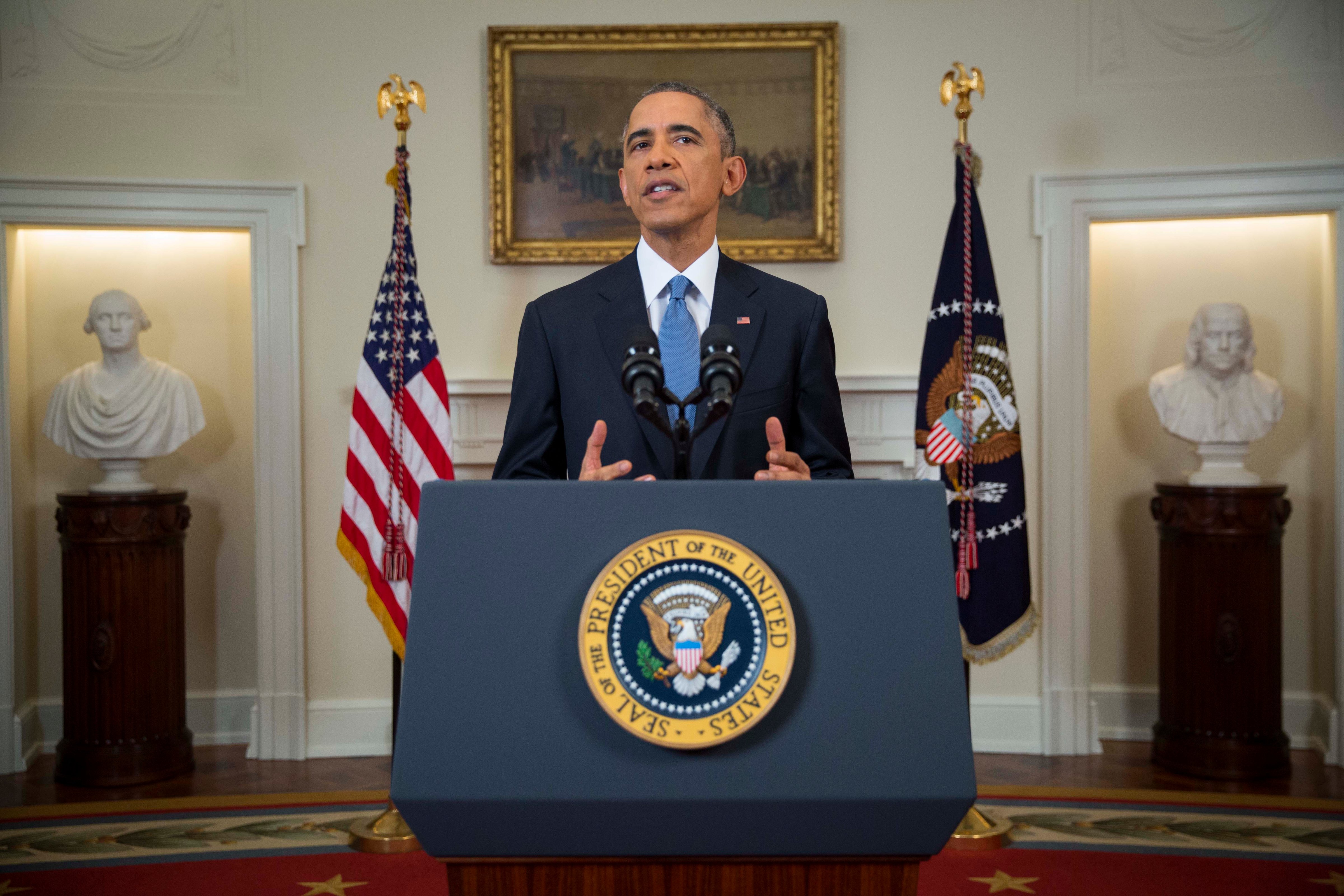 U.S. President Barack Obama speaks to the nation about normalizing diplomatic relations the Cuba in the Cabinet Room of the White House on December 17, 2014 in Washington, DC. (Pool&mdash;Getty Images)