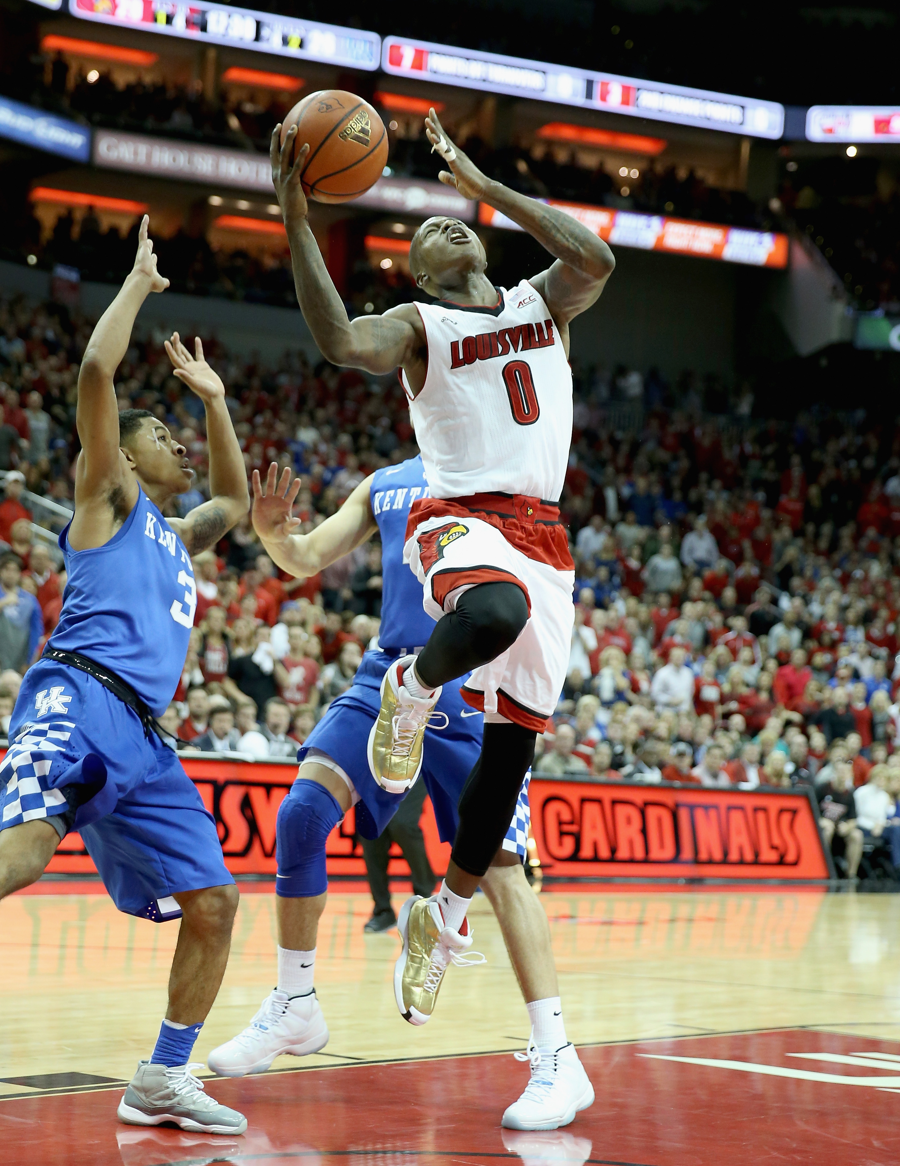 Terry Rozier #0 of the Louisville Cardinals shoots the ball during the game against the  Kentucky Wildcats at KFC YUM! Center on December 27, 2014 in Louisville, Kentucky. (Andy Lyons—Getty Images)