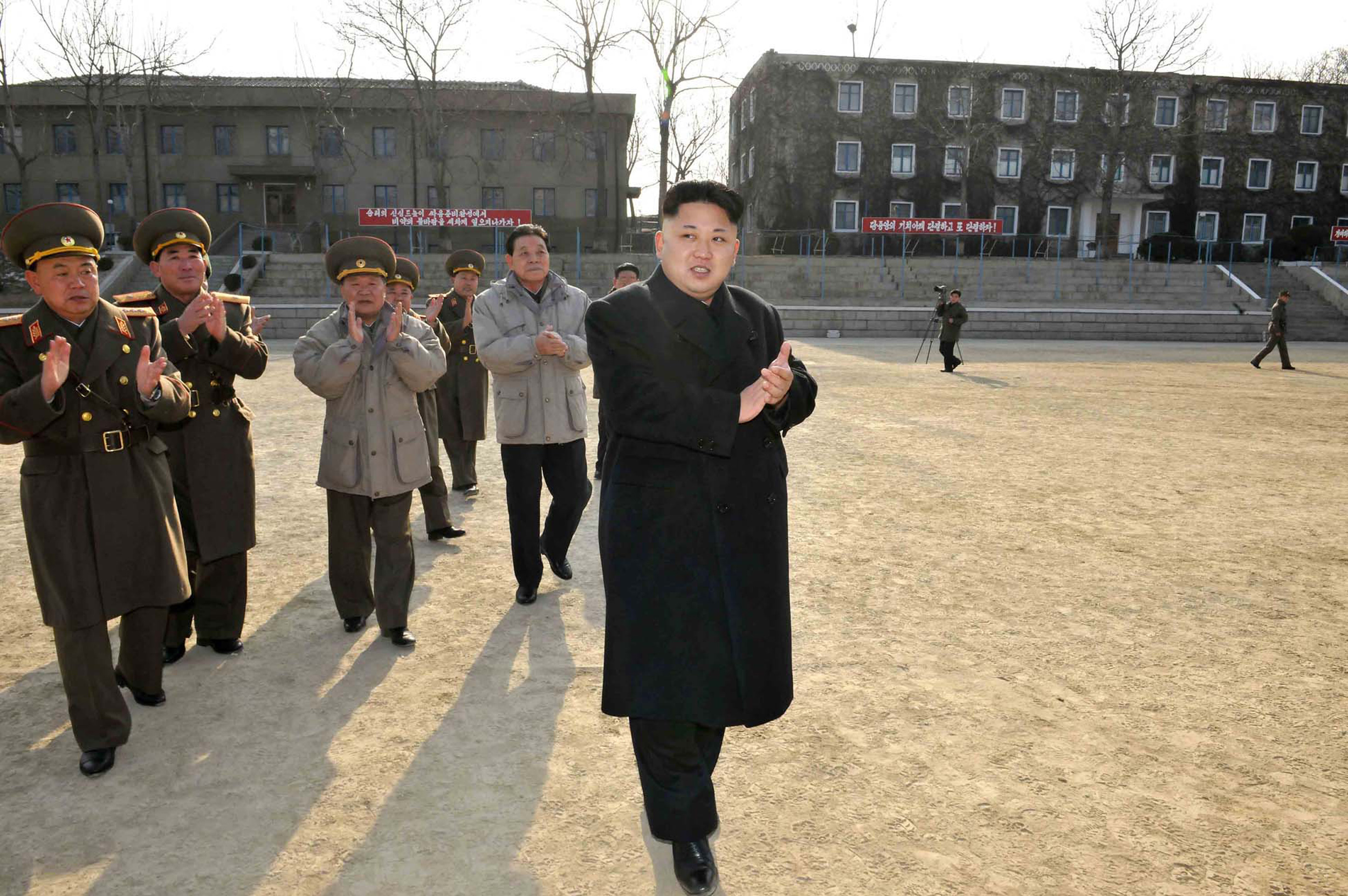 This undated picture released from North Korea's official Korean Central News Agency (KCNA) on January 12, 2014 shows North Korean leader Kim Jong-Un inspecting the command of Korean People's Army  Unit 534. (KNS—AFP/Getty Images)