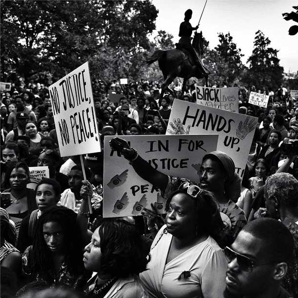 Hundreds of demonstrators gather in DC's #MeridianHillPark aka #MalcolmXpark to honor, and hold a #momentOfSilence for, #MichaelBrown, the unarmed teenager recently killed by police in #Ferguson, MO, and all others affected by #policeBrutality. (photo by @jaheezus aka jahi chikwendiu/The Washington Post) #NMOS14