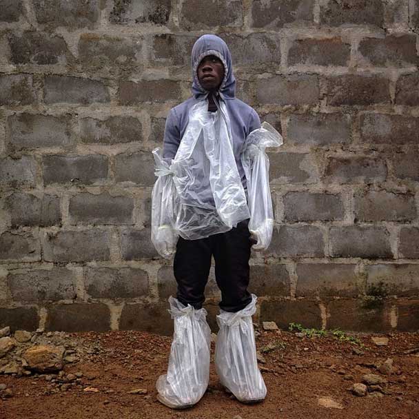 A homemade personal protection suit. This man brought his sick mother to the #Ebola clinic in #monrovia #liberia.