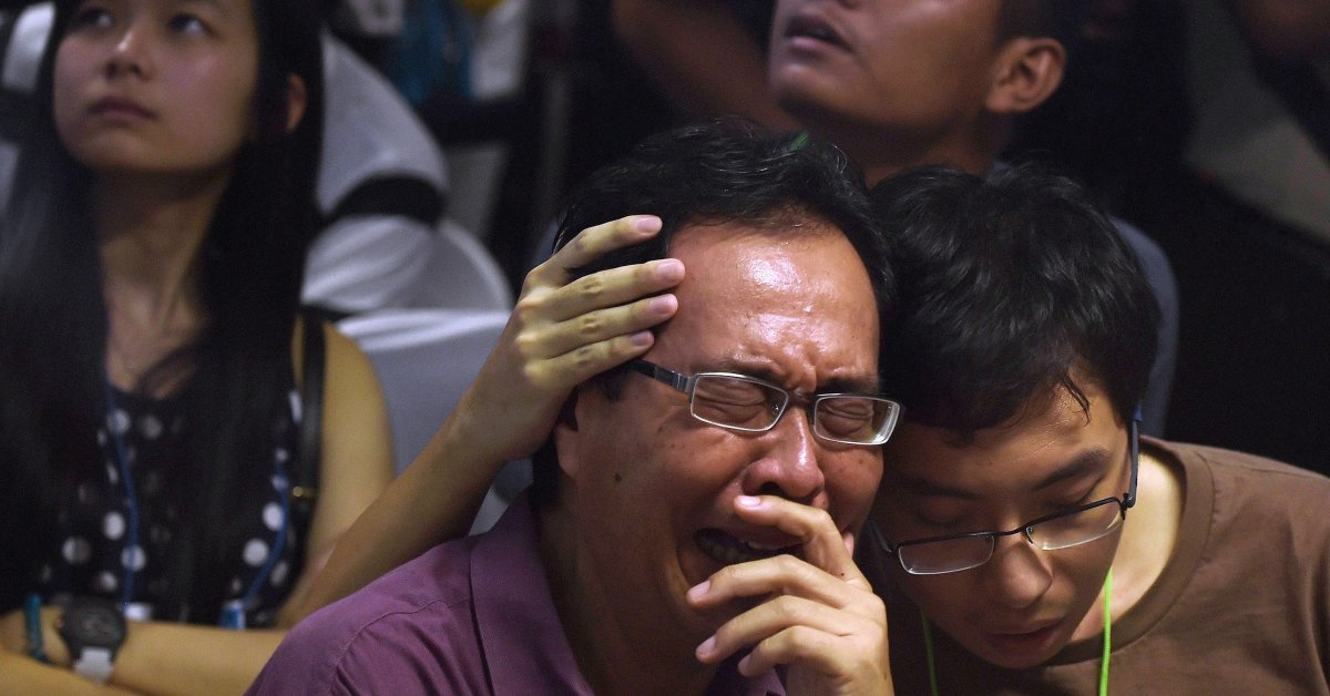 AirAsia QZ 8501: Relatives in Shock as TV Images of ...