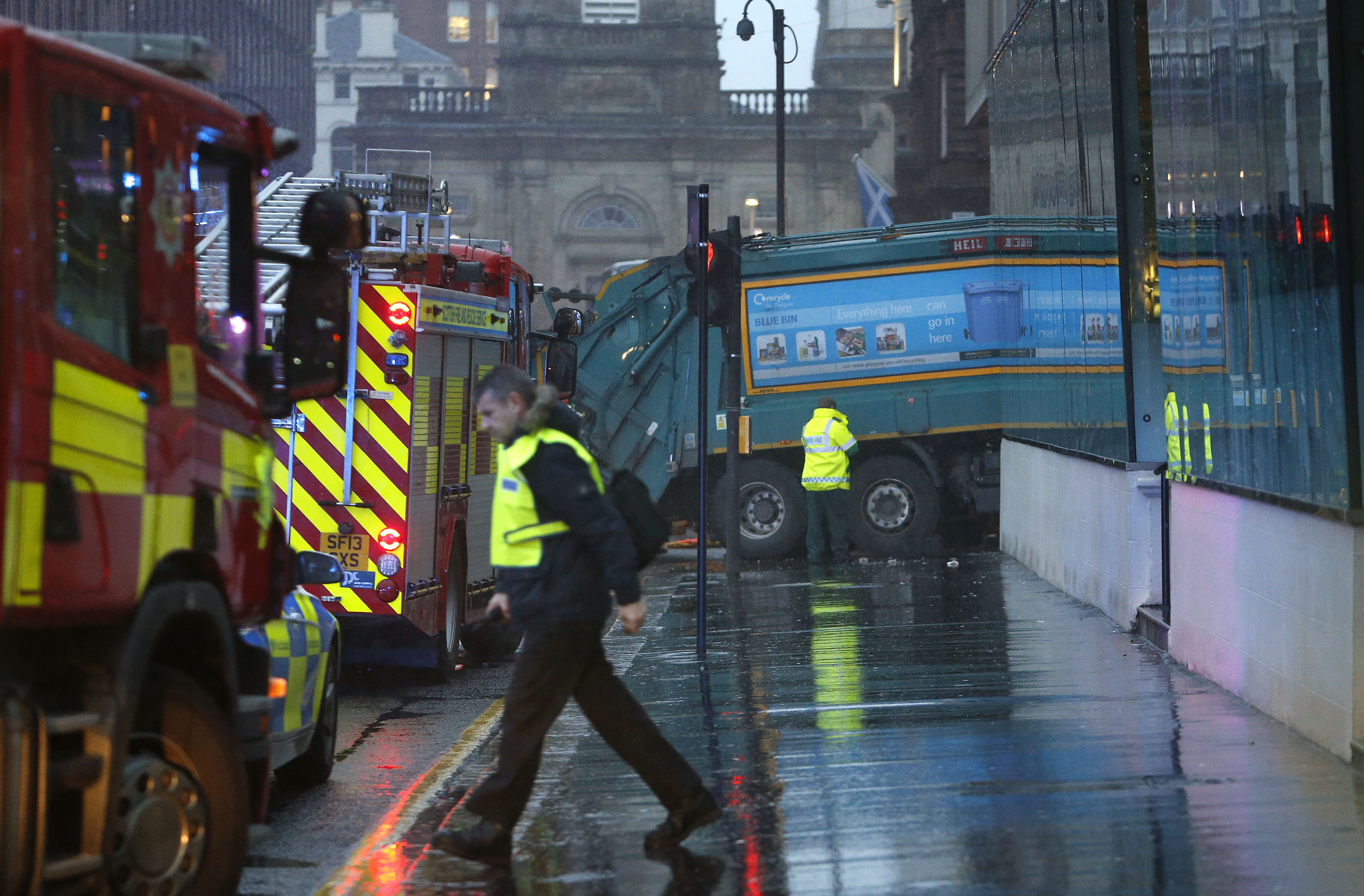 The scene in Glasgow's George Square after it is understood a bin lorry crashed into a group of pedestrians on Dec. 22, 2014. (Danny Lawson—PA)