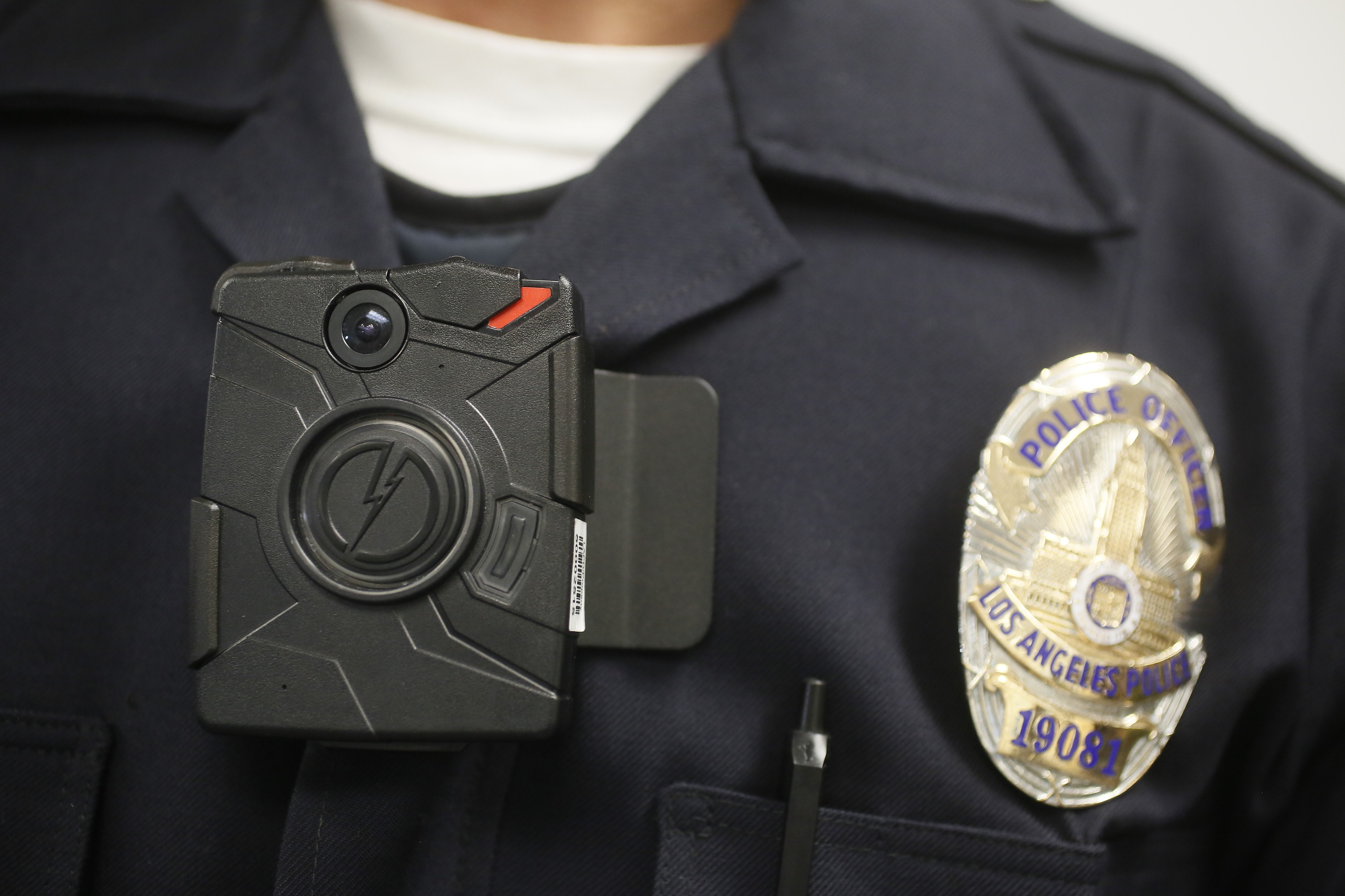 A Los Angeles Police officer wears an on-body camera Jan. 15, 2014. Los Angeles Mayor Eric Garcetti plans to equip every LAPD officer with a camera. (Damian Dovarganes—AP)