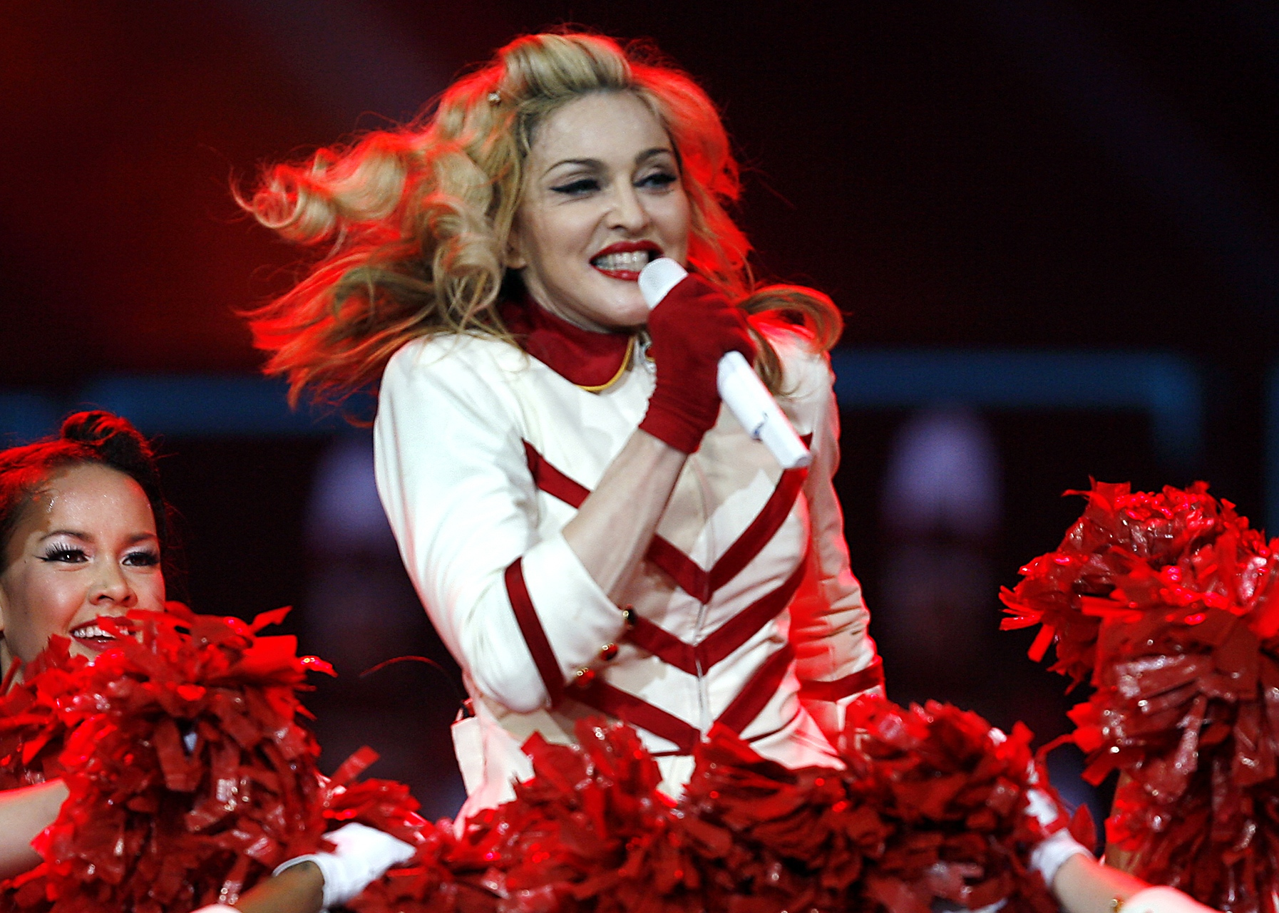 FILE - In this Nov. 8, 2012, file photo, Madonna performs at the Joe Louis Arena in Detroit. Madonna, who was "inspired" during a recent visit to Detroit, is donating money toward the construction of a new youth boxing gym and buying iPods, iPads and other supplies for students at a charter school in her hometown, according to a news release issued by the music icon's publicist Monday, June 30, 2014. The statement said Madonna's donations to three Detroit organizations represent "the first phase of a long-term commitment to" the city. (Photo by Gary Malerba/Invision/AP, file) (Gary Malerba&mdash;Gary Malerba/Invision/AP)