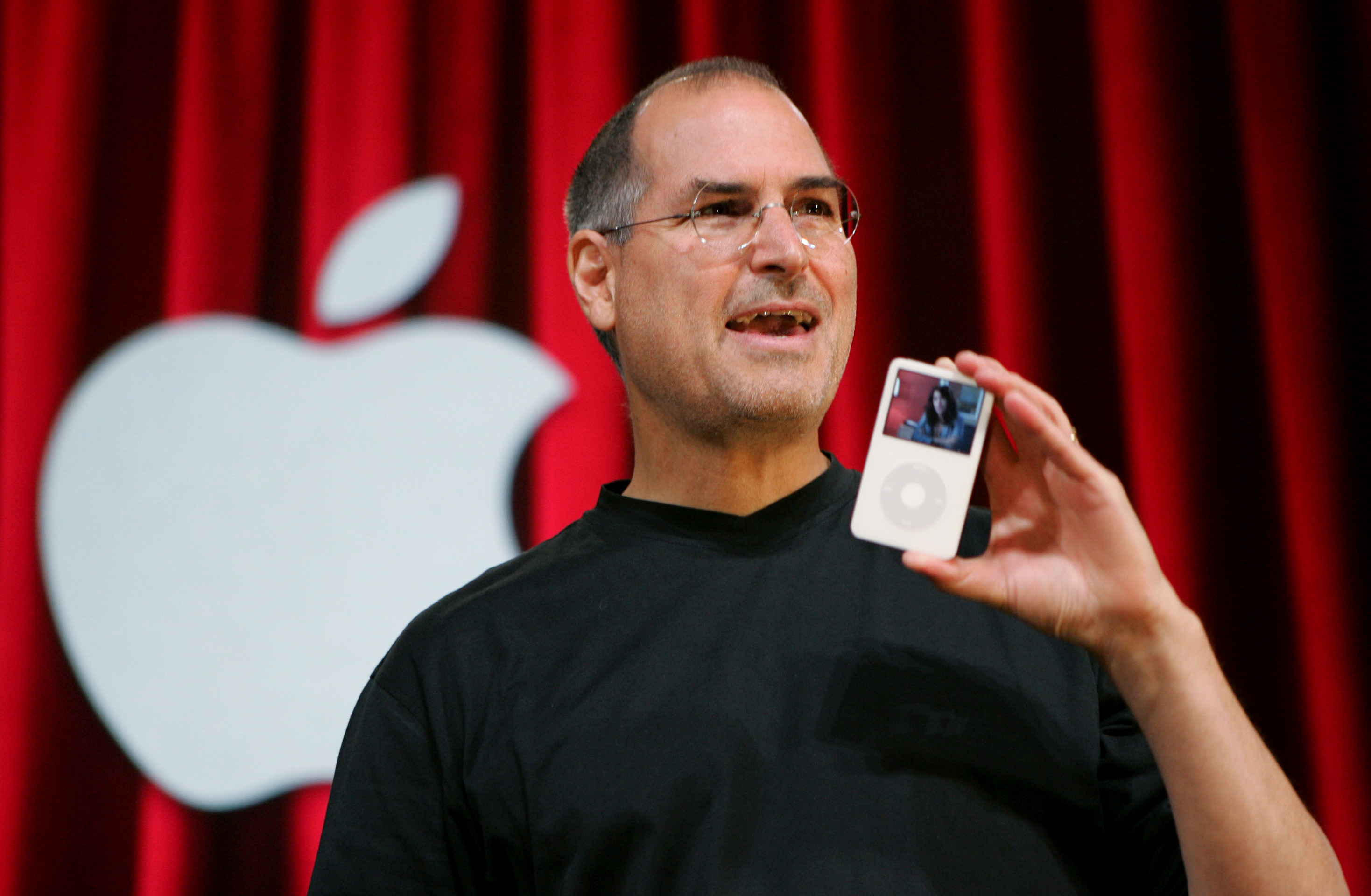The late Apple CEO Steve Jobs holds up an iPod during an event in San Jose, Calif. on Oct. 12, 2005. (Paul Sakuma&mdash;AP)