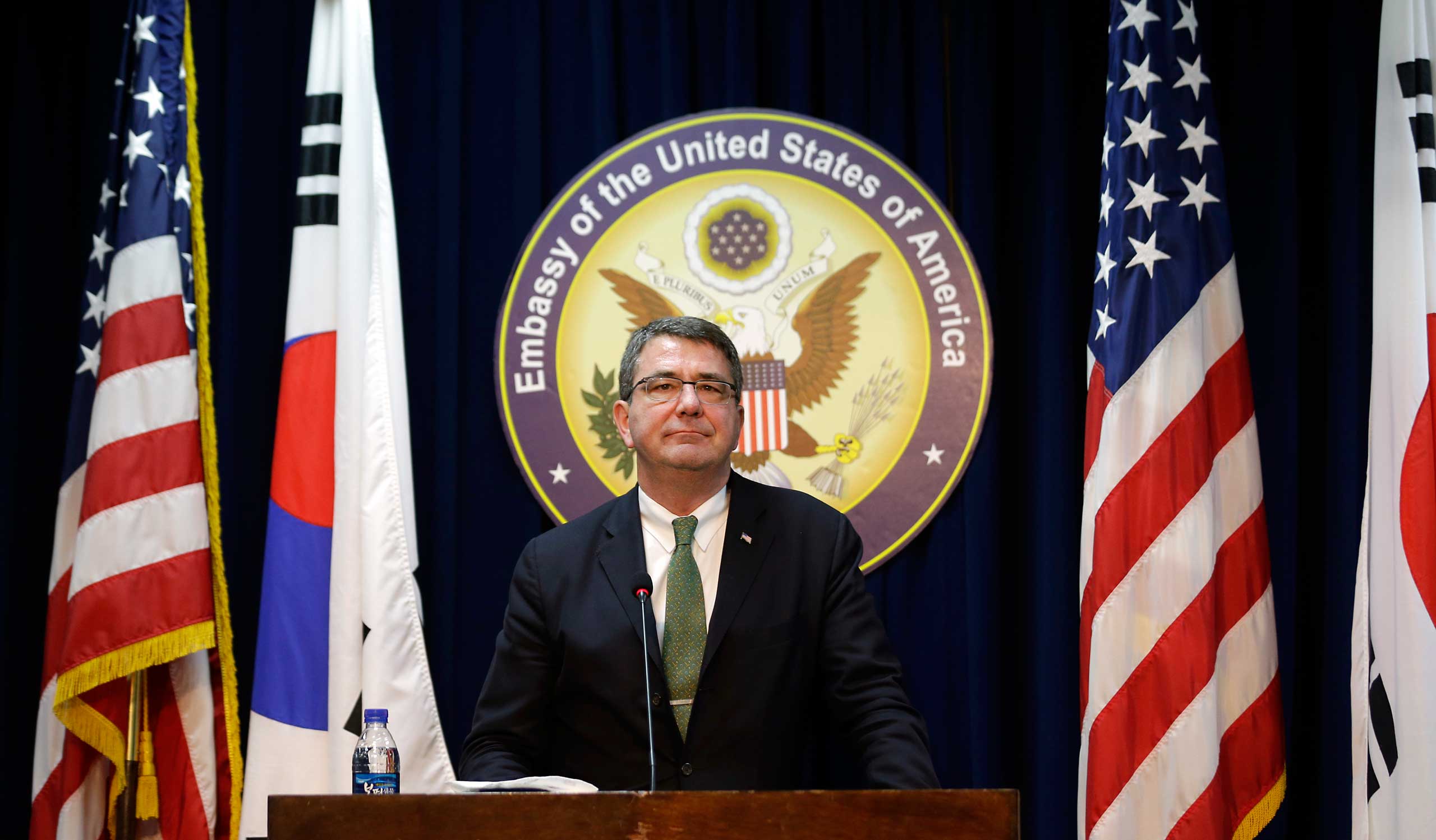 U.S. Deputy Secretary of Defense Ashton Carter listens to reporters' question during a news conference at the U.S. Embassy in Seoul on March 18, 2013. (Lee Jin-man—AP)