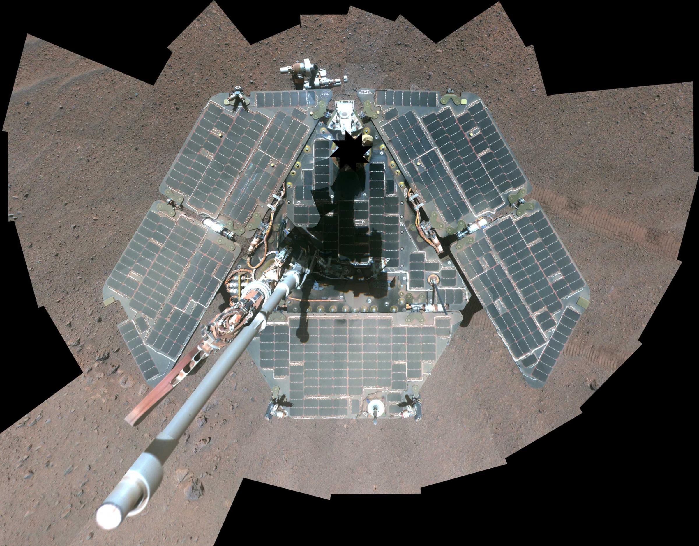 A self-portrait of the Opportunity rover shortly after dust cleared its solar panels in March 2014.
