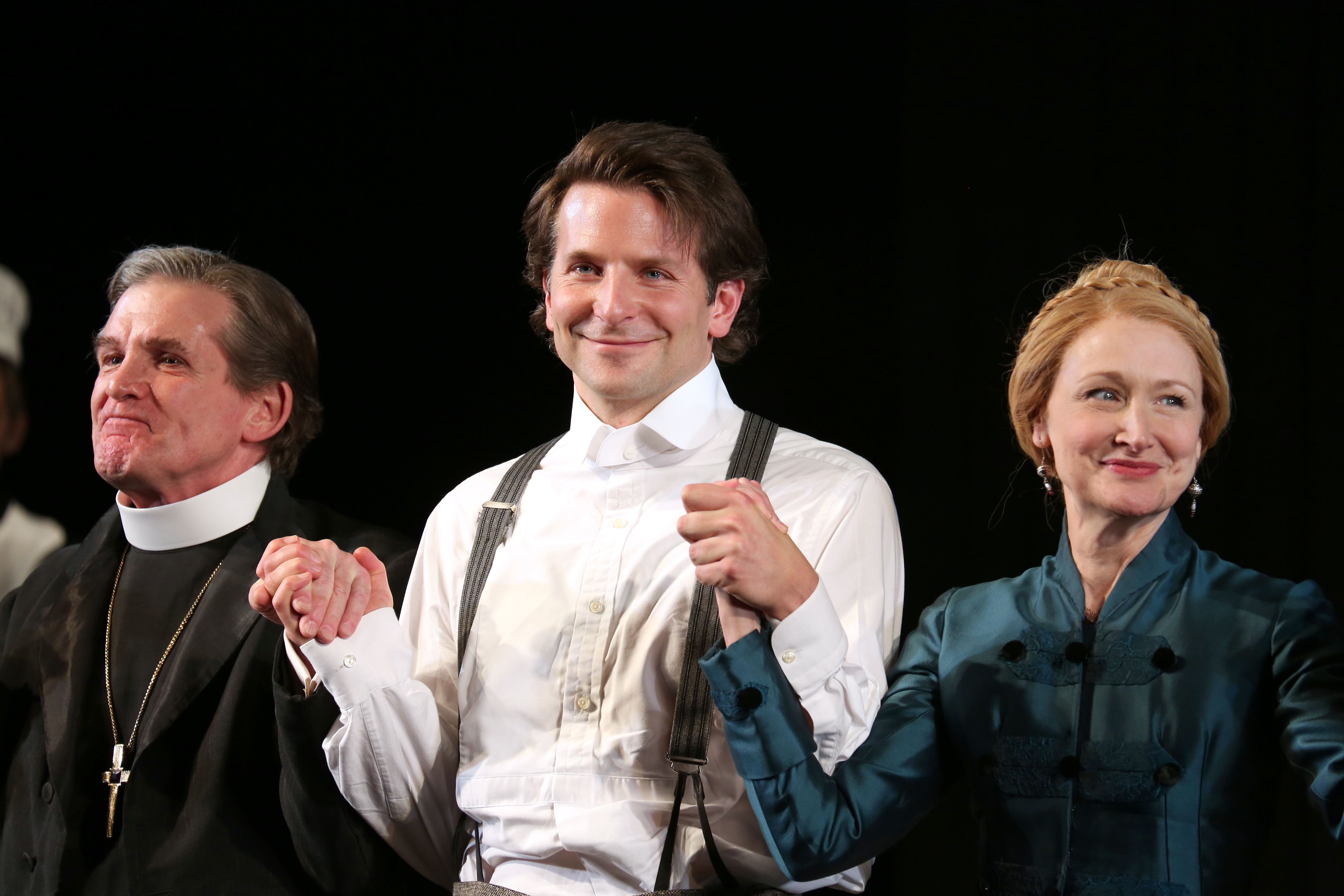 From left: Anthony Heald, Bradley Cooper and Patricia Clarkson during the Broadway opening-night-performance curtain call for <i>The Elephant Man</i> on Dec. 7, 2014, in New York City (Walter McBride—Getty Images/WireImage)