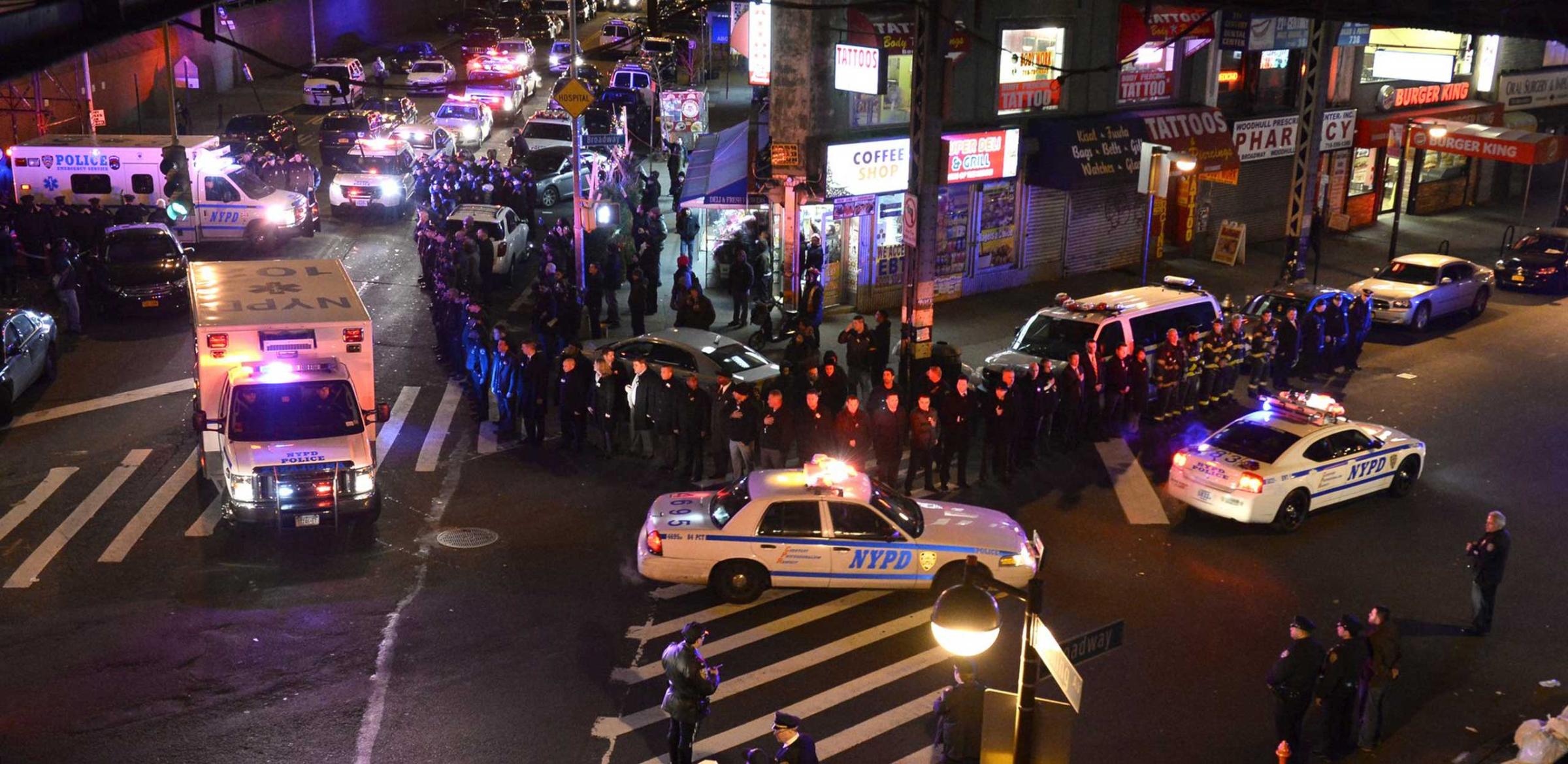 NY police salute fallen comrades