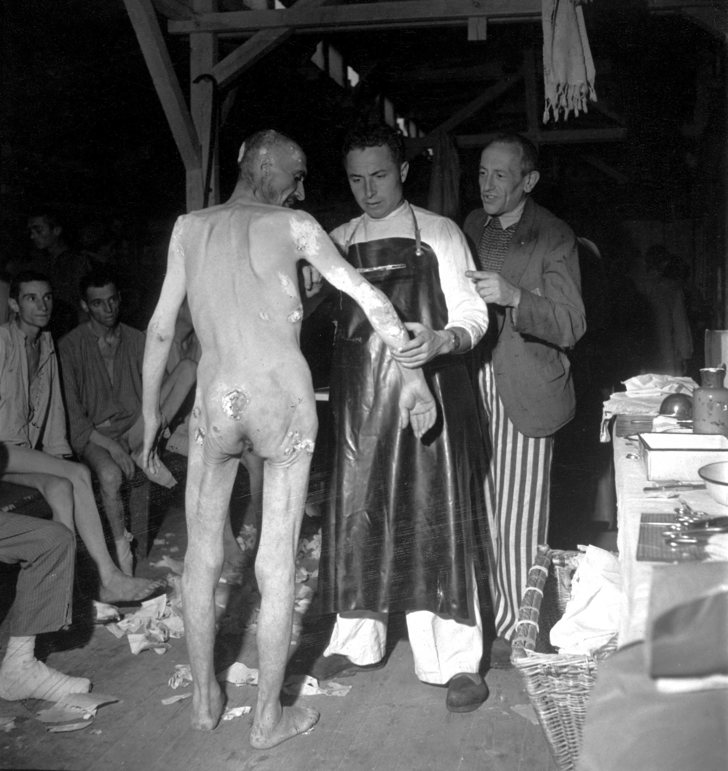 Not published in LIFE. Examining Buchenwald prisoners after the camp's liberation by U.S. troops, April 1945.