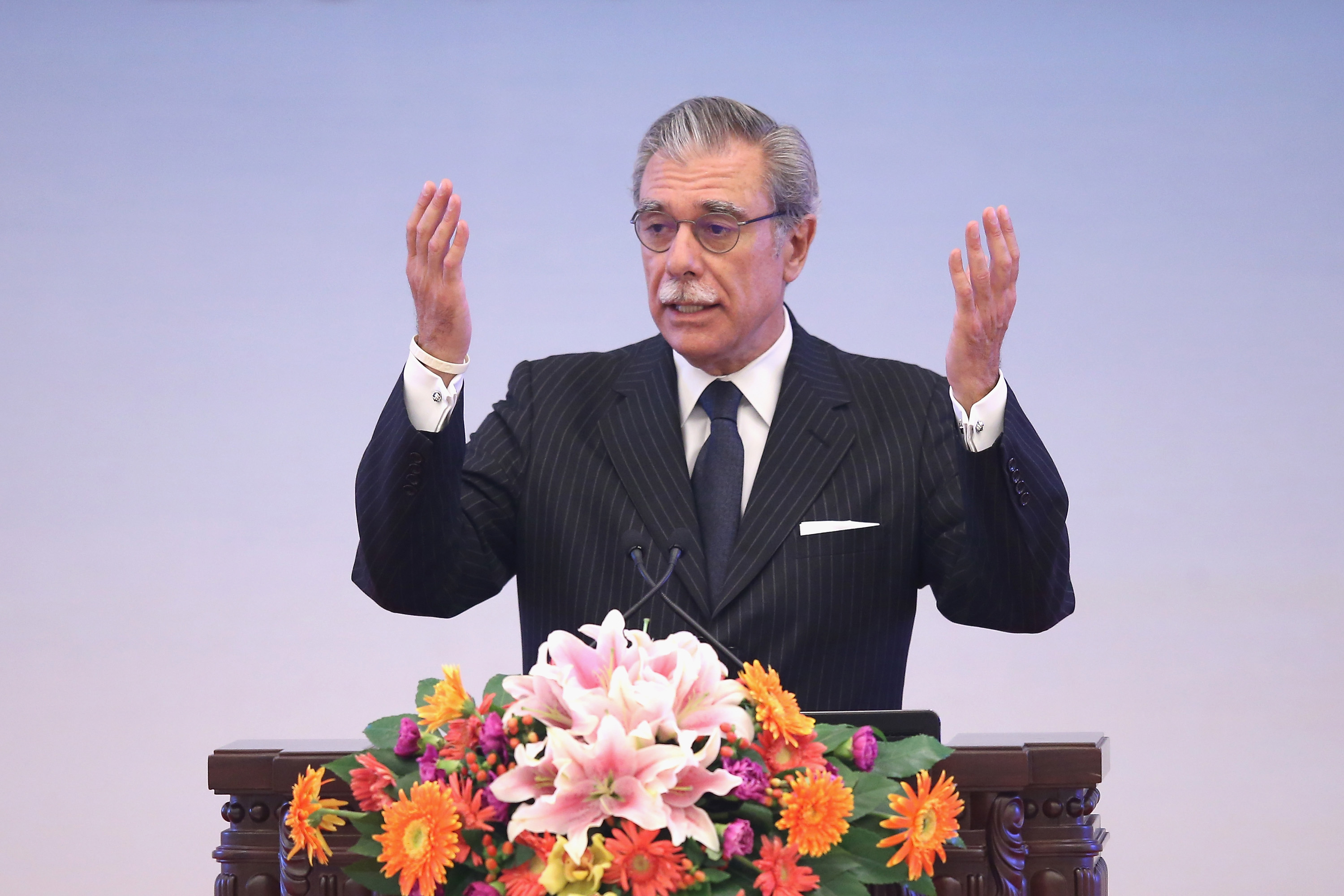 Former U.S. Secretary of Commerce Carlos Gutierrez gives a speech during the opening session of the 1st China Conference of Quality at The Great Hall Of The People on Sept. 15, 2014 in Beijing. (Feng Li—Getty Images)