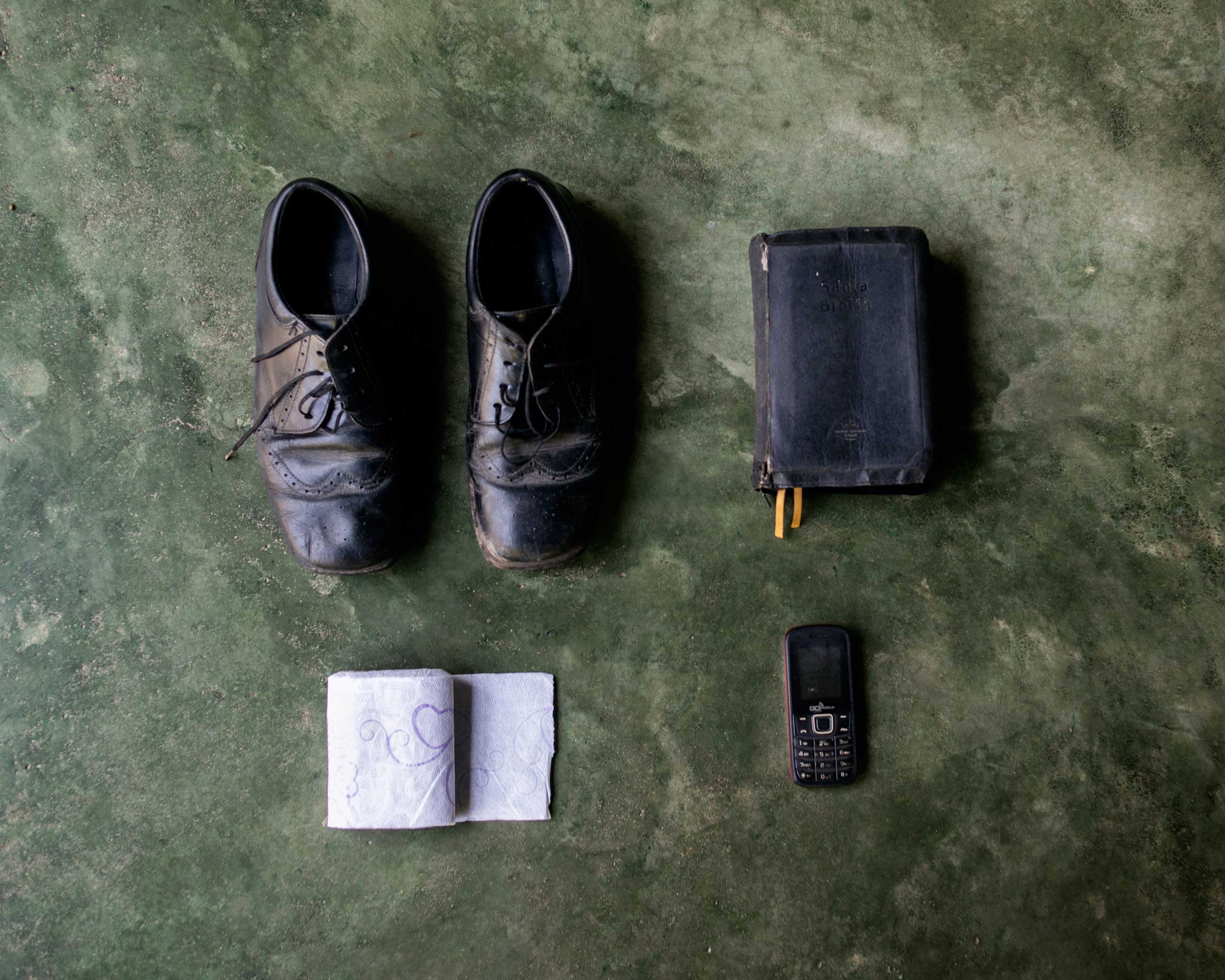 Alfredo Núñez, 46, from El Salvador. He wants to go to the U.S. but he thinks it would be okay if he can reach the north of Mexico and find a job there. In his bag, he has a pair of shoes, a bible, toilet paper and a cell phone.