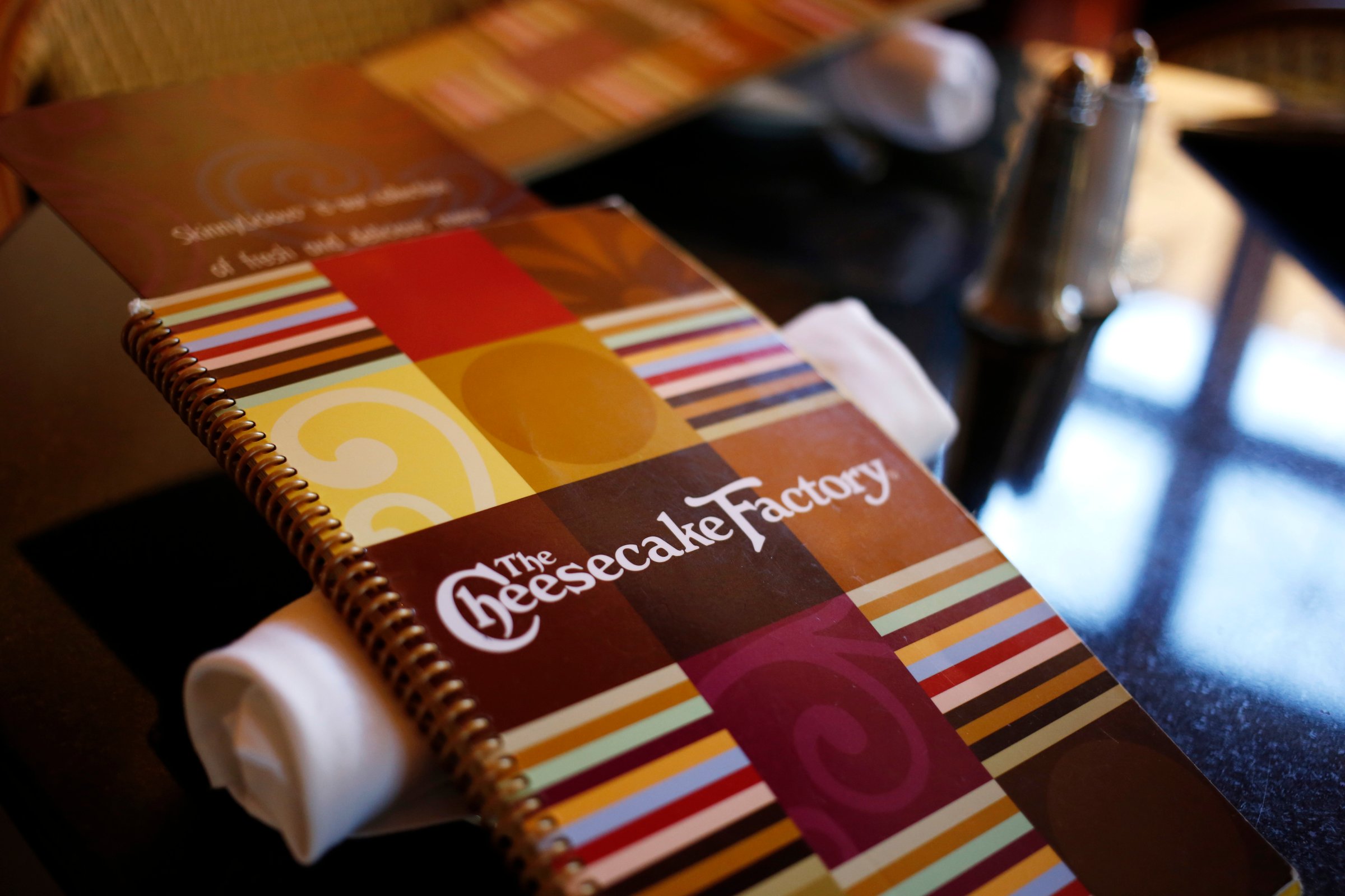 A menu sits on a table at a Cheesecake Factory restaurant in Louisville, Kentucky on Nov. 13, 2013.