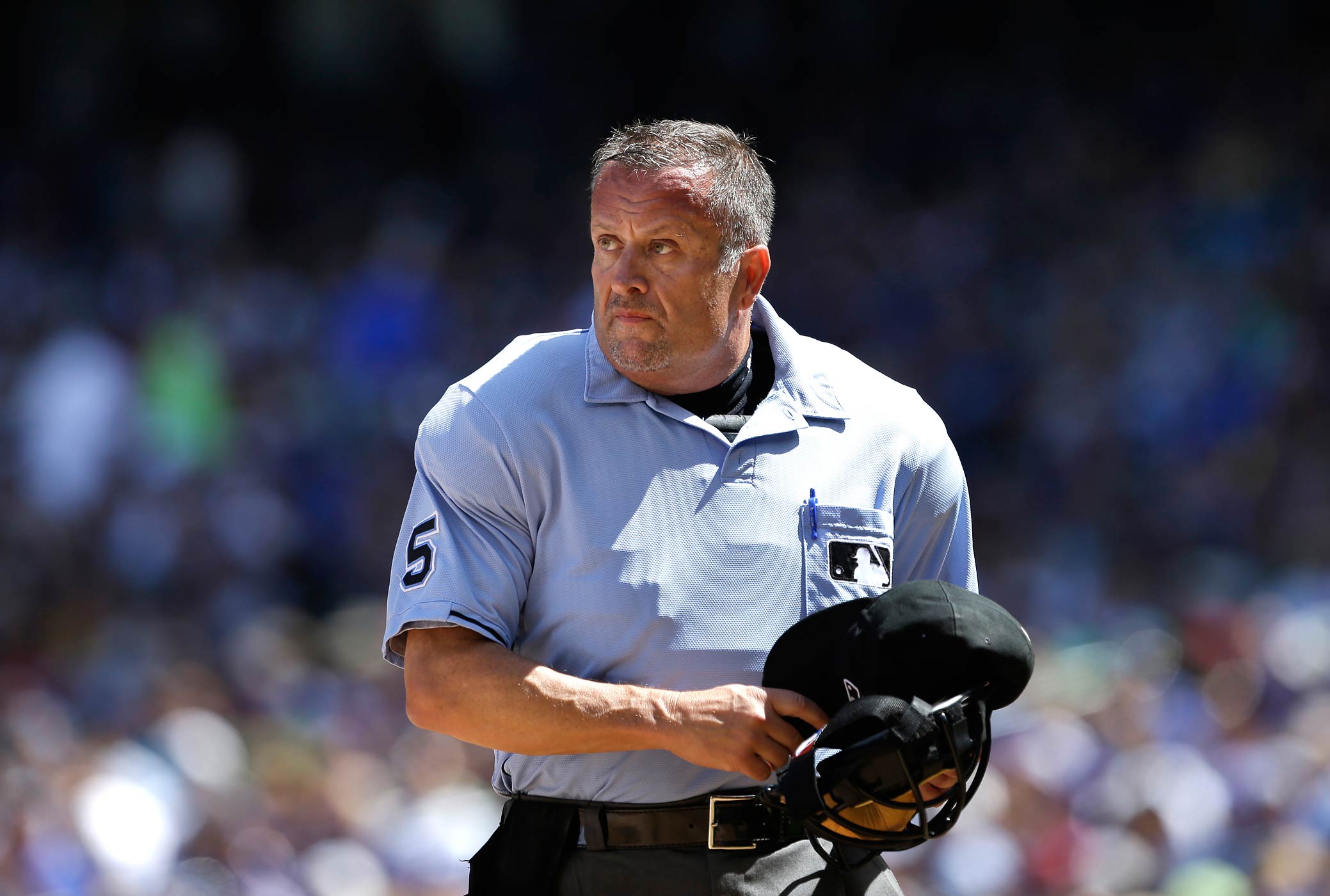 Umpire Dale Scott officiates a game between the Mariners and Toronto Blue Jays on Aug. 7, 2013, in Seattle, Wa. (Elaine Thompson—AP)