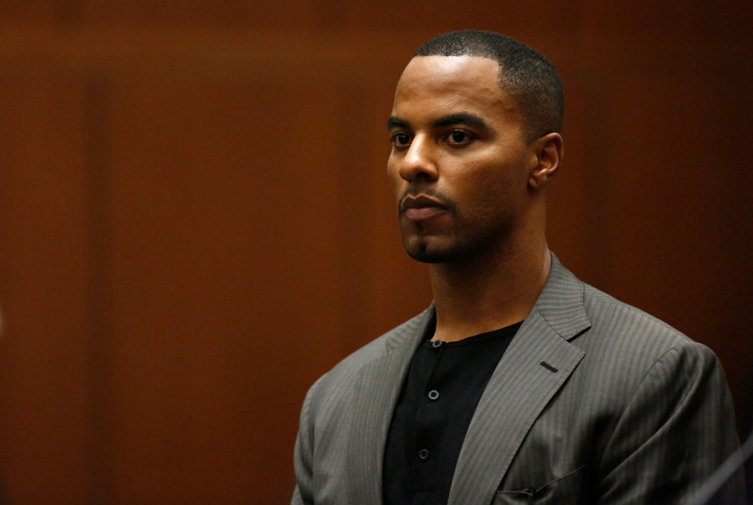 Former professional football player Darren Sharper appears for his arraignment in Los Angeles, Ca on Feb. 20, 2014