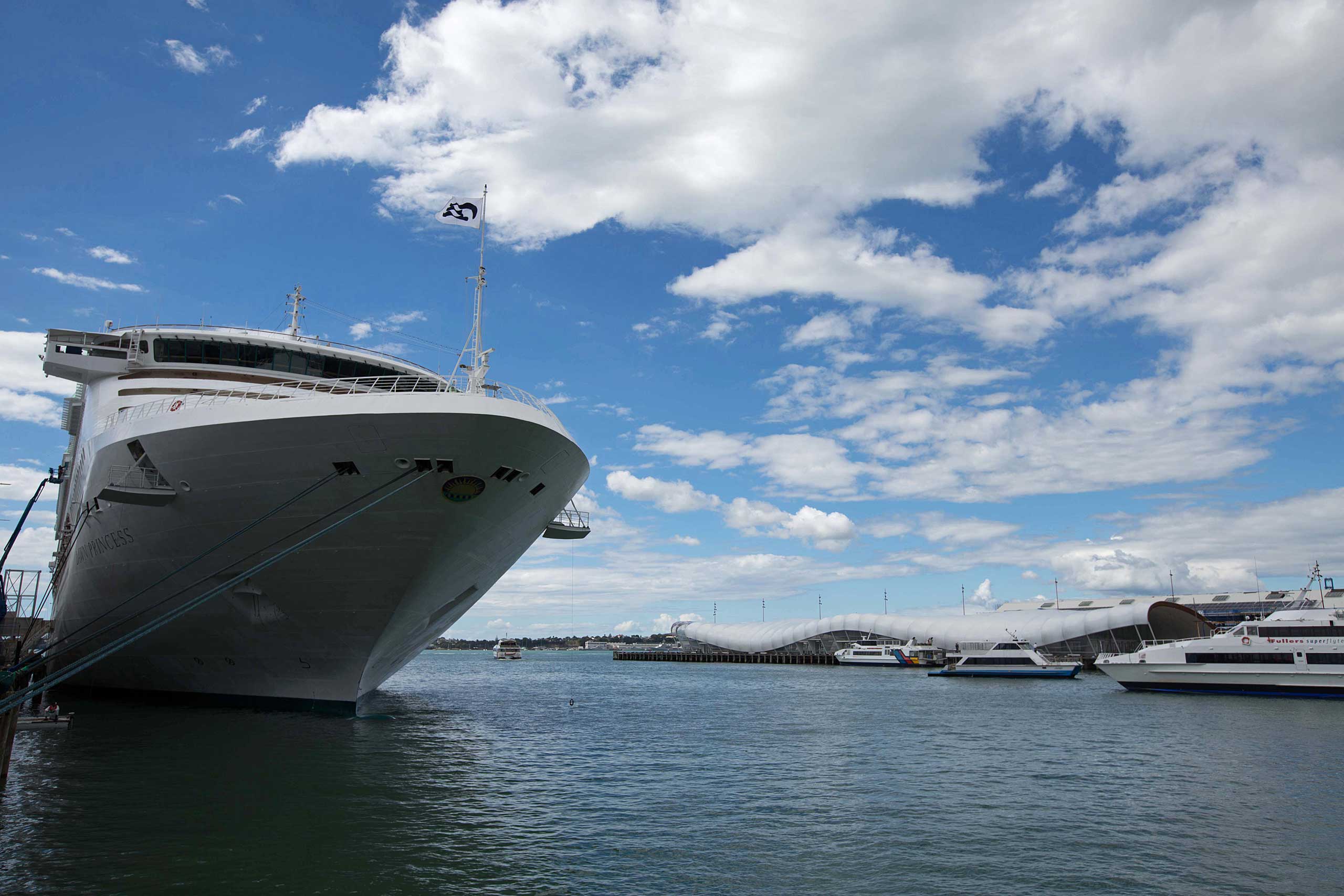 The passenger liner Dawn Princess, operated by Carnival Corp.'s Princess Cruises, sits docked at the Overseas Passenger Terminal at Princes Wharf in Auckland, New Zealand, on March 20, 2013.