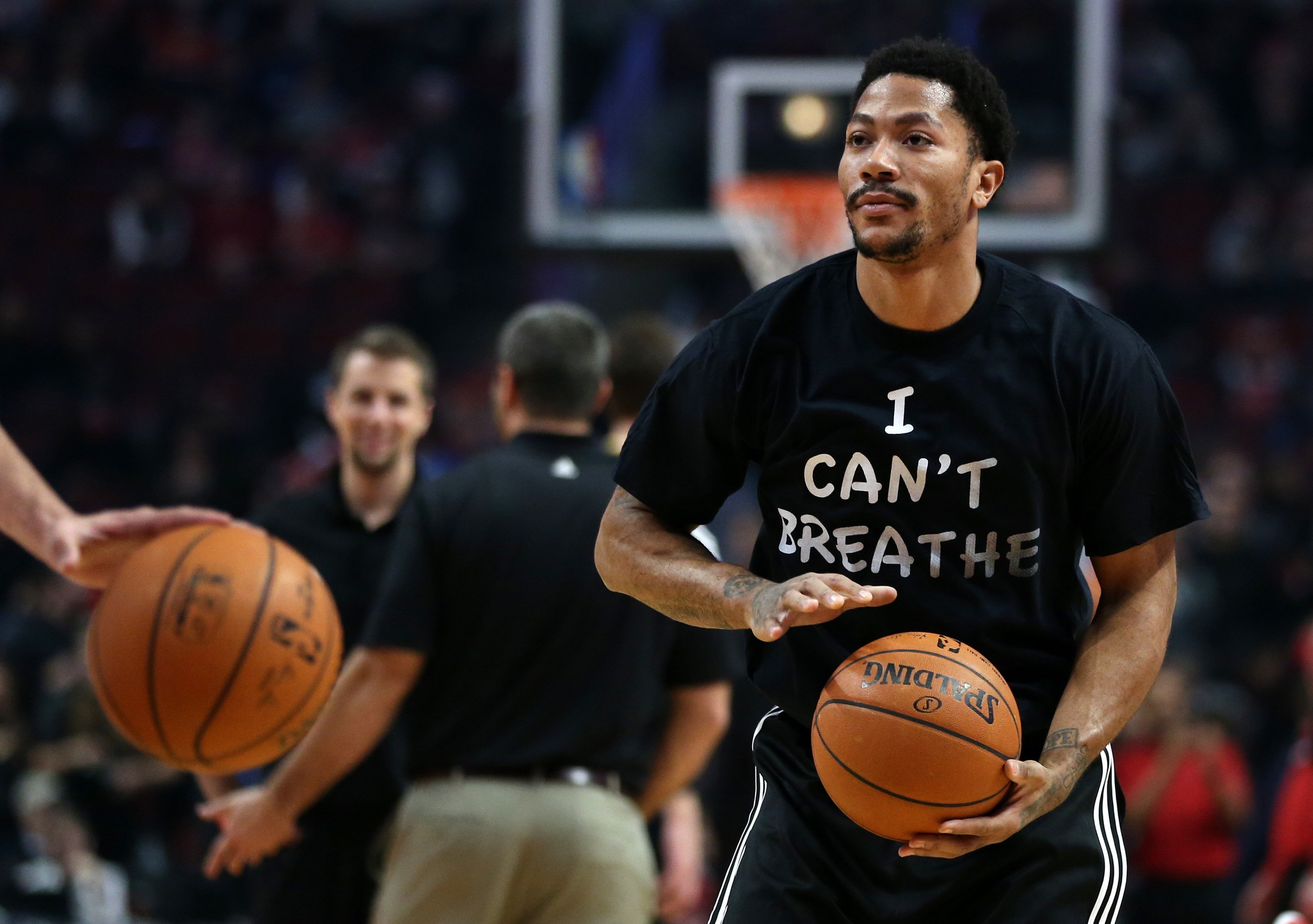 Chicago Bulls guard Derrick Rose wears a shirt reading "I Can't Breath" while warming up for a game against the Golden State Warriors on Dec. 6, 2014 at the United Center in Chicago. (Chris Sweda—Chicago Tribune/Landov)