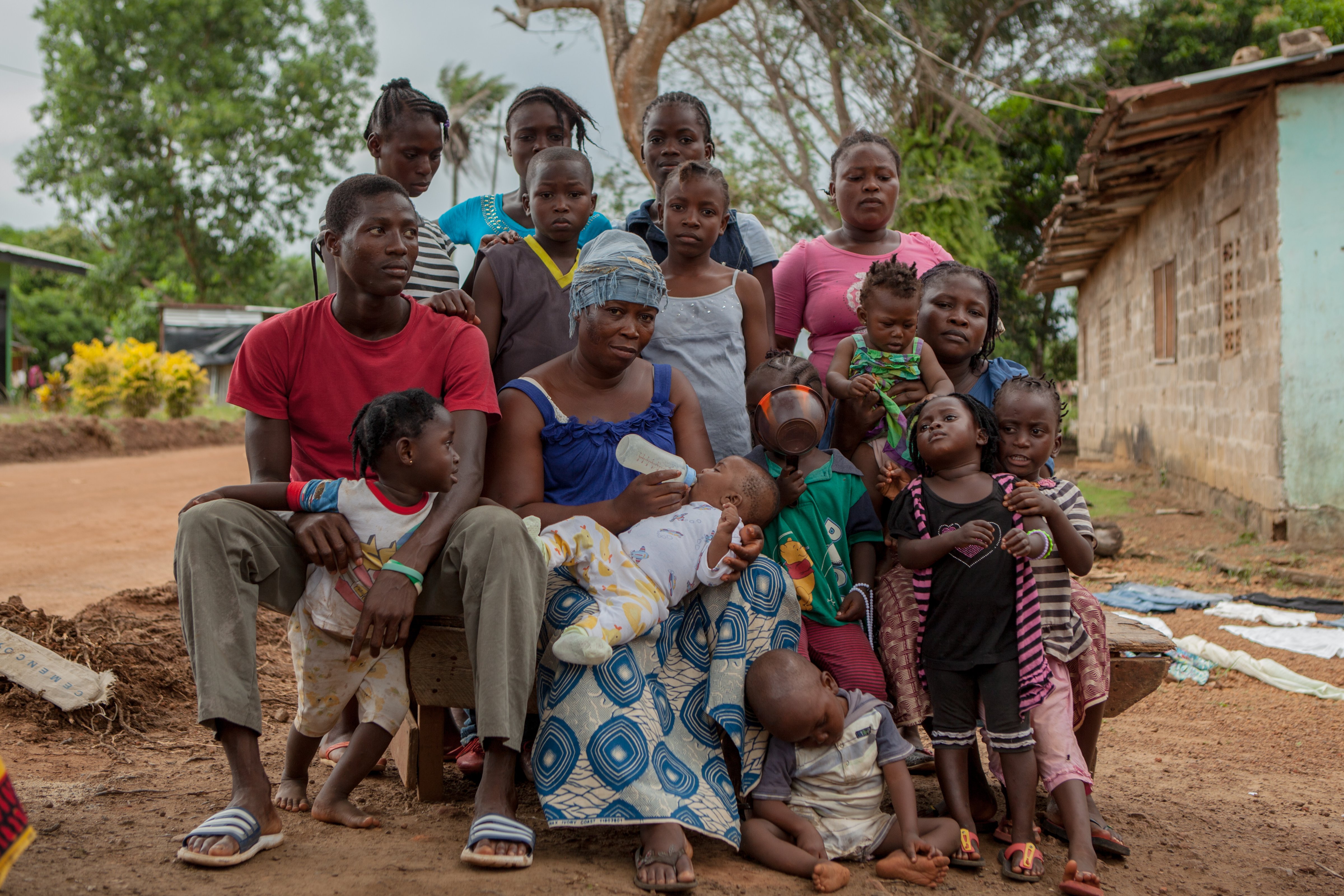 Dudu Kromah's husband died from Ebola. She is looking after ten children, many of them orphans including a 3-month-old baby. She has no income. (Carly Learson—Carly Learson / UNDP)