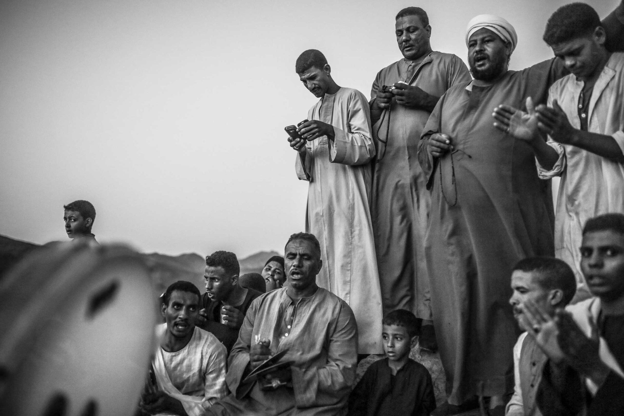 Sufi Muslims sing hymns and recite chants during the week-long celebrations of Abul-Hassan Al-Shazly festival in the Red Sea desert. Sept. 30, 2014.