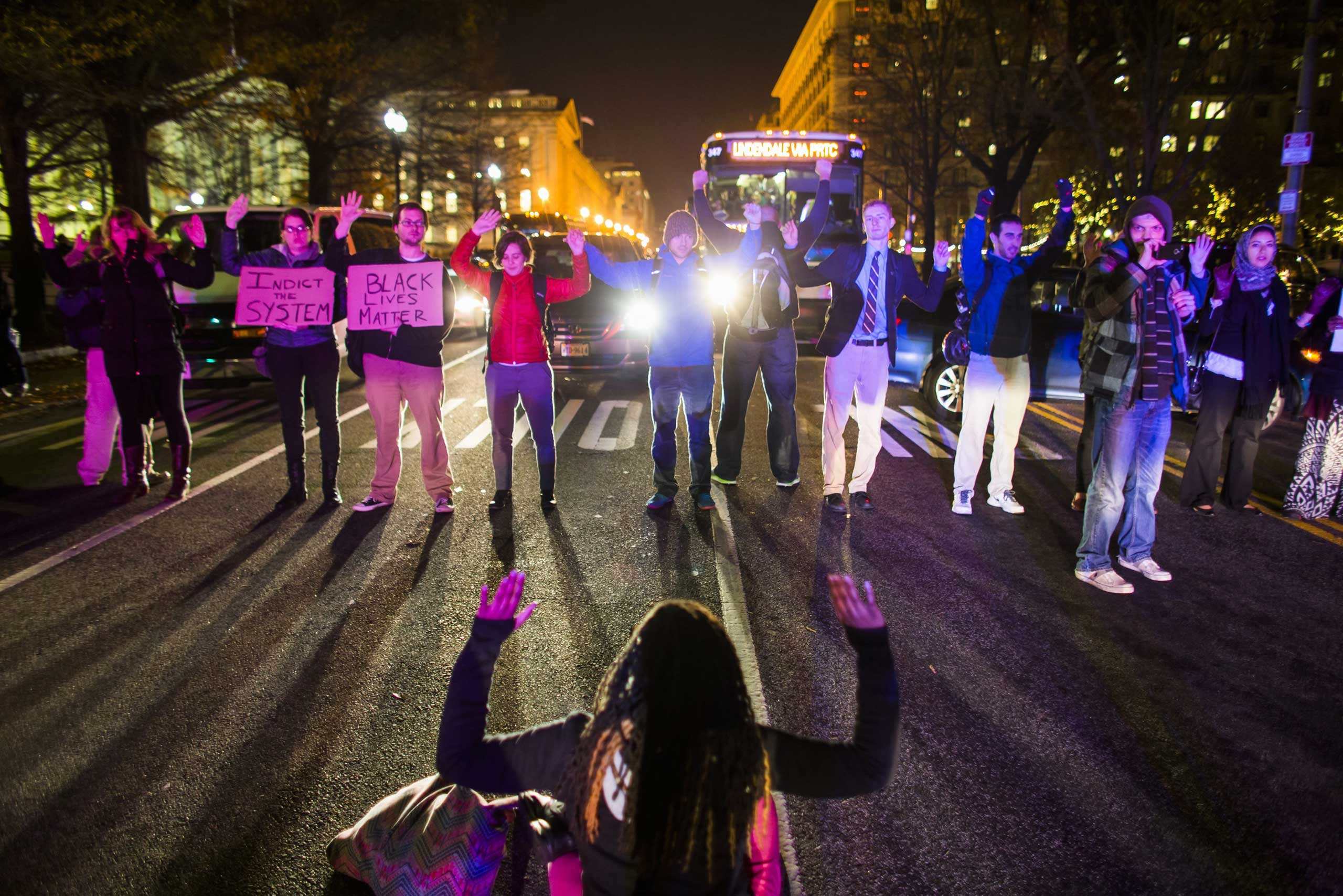 Protestors block 15th Street near Pennsylvania Avenue to protest the Staten Island grand jury's decision not to indict officer Daniel Pantaleo in the Eric Garner chokehold case in Washington on Dec. 3, 2014.