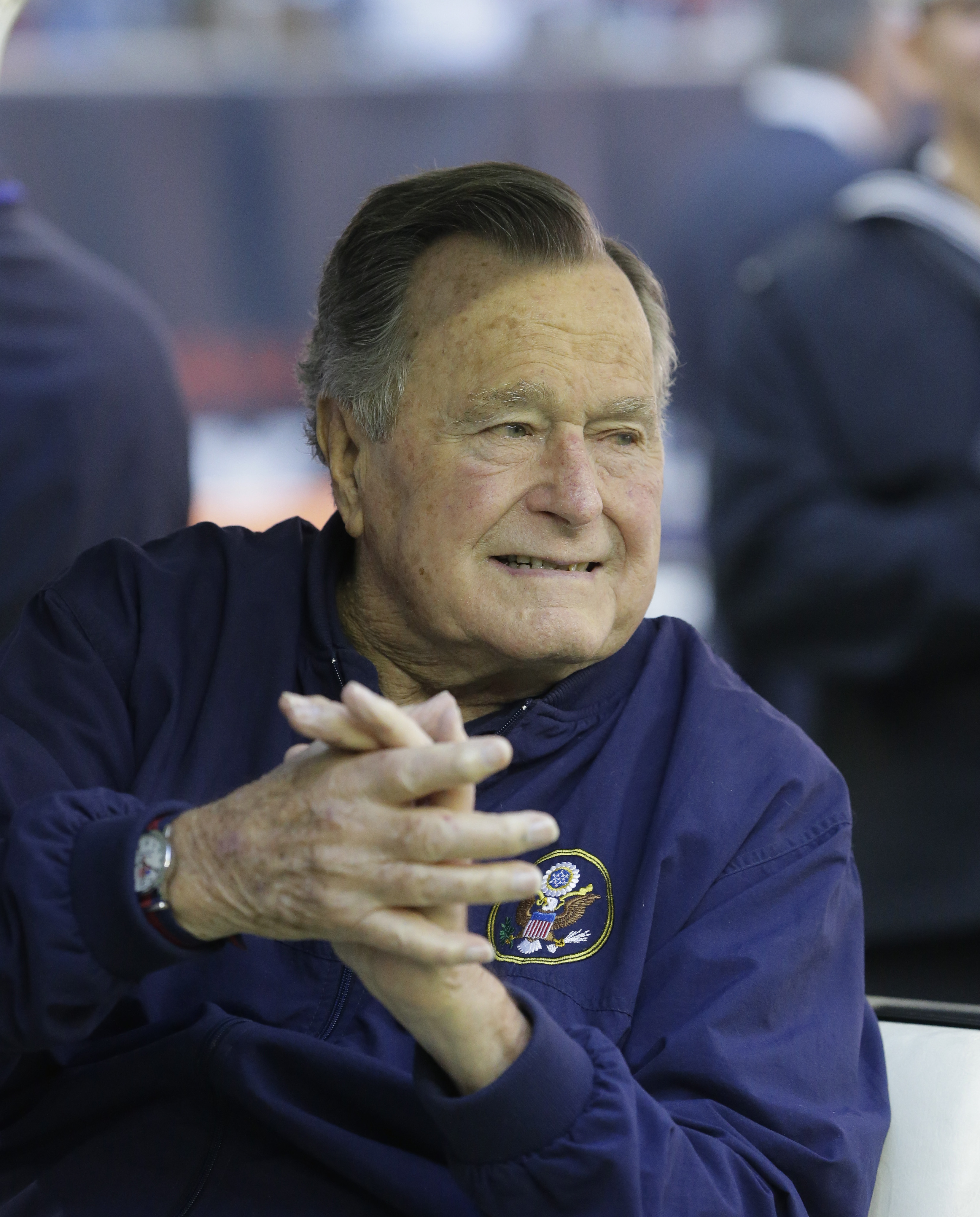 Former president George H. W. Bush attends an NFL football game between the Houston Texans an Cincinnati Bengals on Nov. 23, 2014, in Houston. (Patric Schneider&amp;mdash;AP)