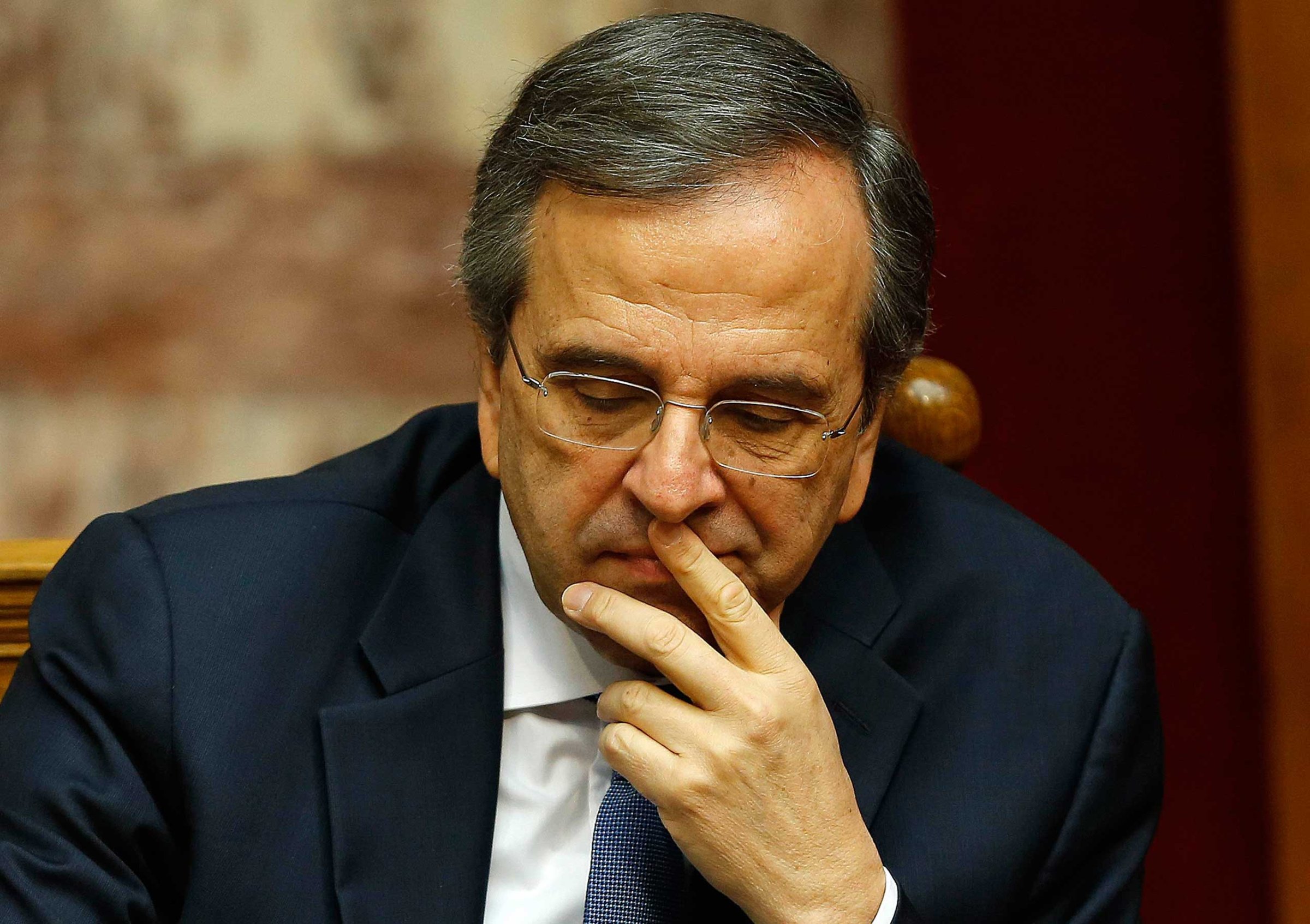 Greek Prime Minister Samaras reacts in parliament during the last round of a presidential vote in Athens
