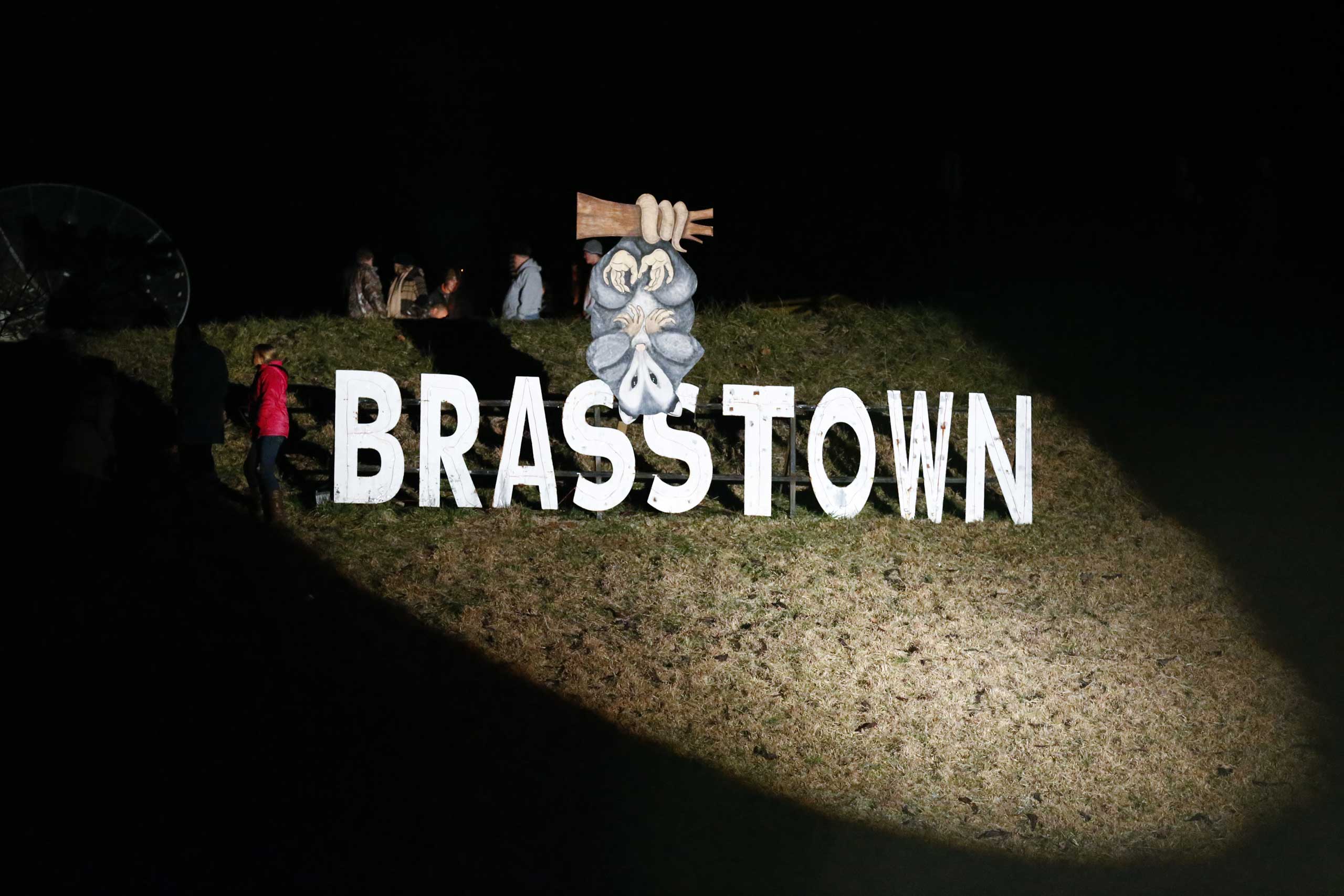 A sign honoring the possums of Brasstown is seen during the 20th annual Possum Drop on New Year's Eve at Clay's Corner in Brasstown, North Carolina, Dec. 31, 2013. (Erik S. Lesser—EPA)