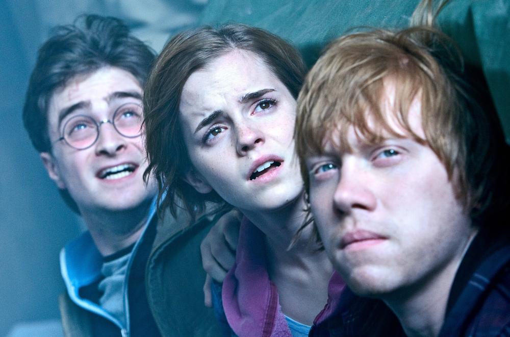 Harry Potter and the Deathly Hallows, Part 2. , Left to right: Daniel Radcliffe, Emma Watson, Rupert Grint (Jaap Buitendijk—Warner Bros)