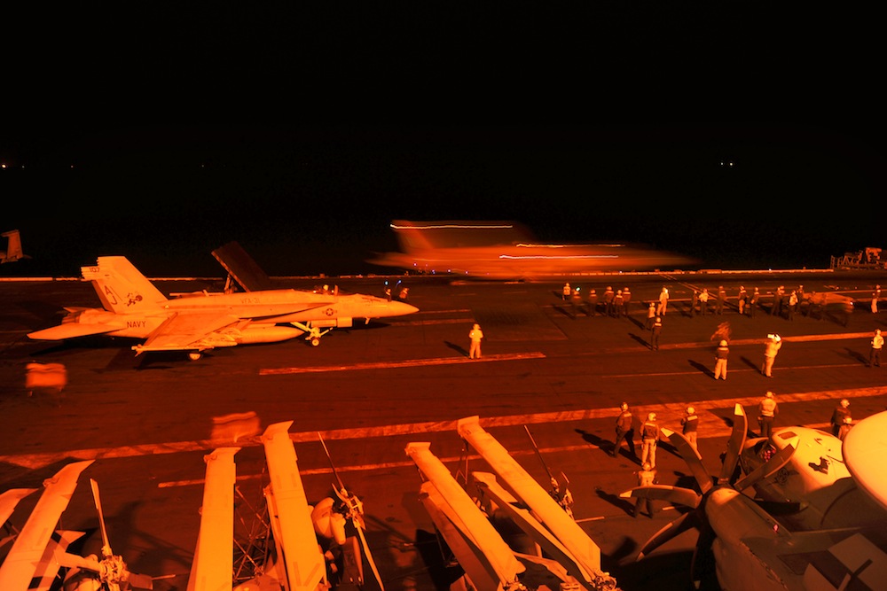 U.S. Navy warplanes prepare to attack ISIS targets. (Navy photo / Robert Burck)