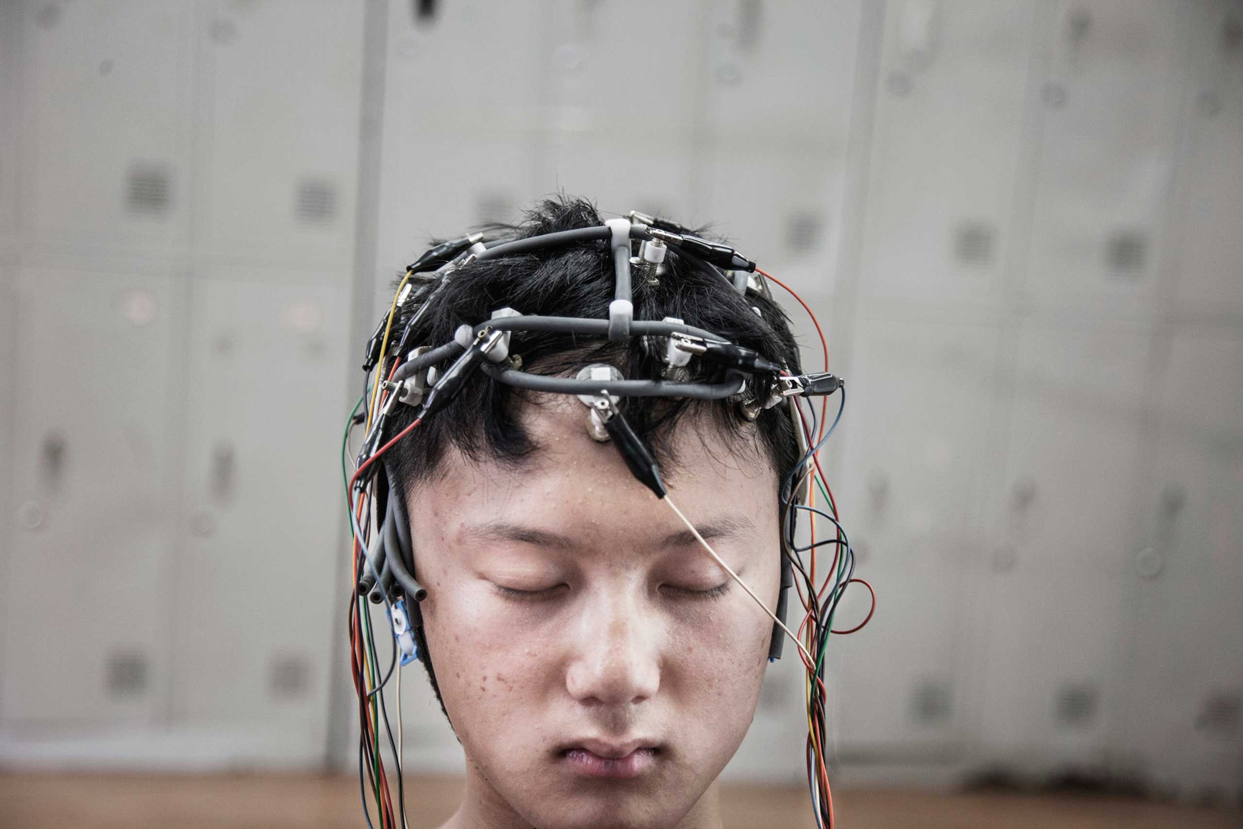 Al Jazeera America:  Inside an Internet Gaming Disorder Rehab Center in China13-year-old Lu Jung Song is checked with to measure his cerebral bioelectrical activity.