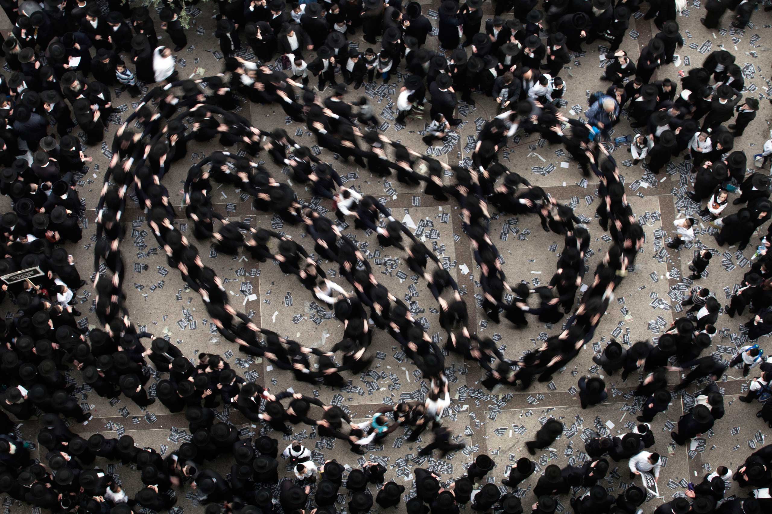 Israel: Protest against new conscription lawsUltra-Orthodox Jews dance as they gather for a mass prayer in protest to the government's army conscription laws in Jerusalem, March 2, 2014.