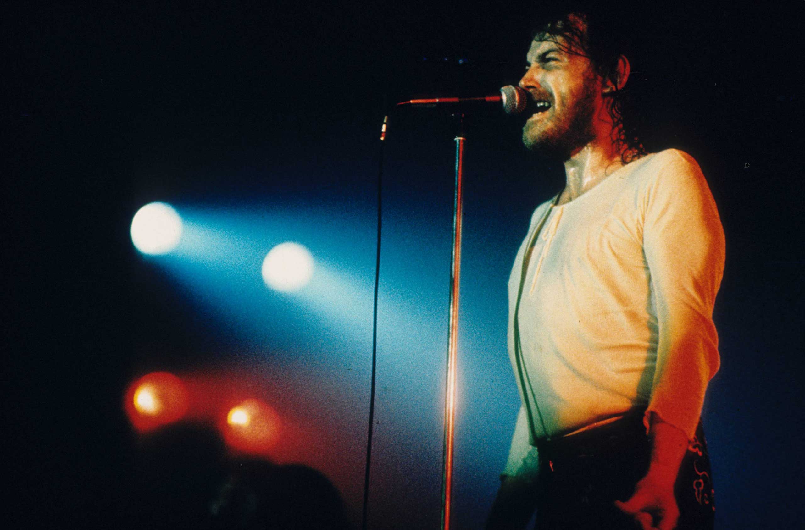 Joe Cocker performs on stage in 1972 in London.
