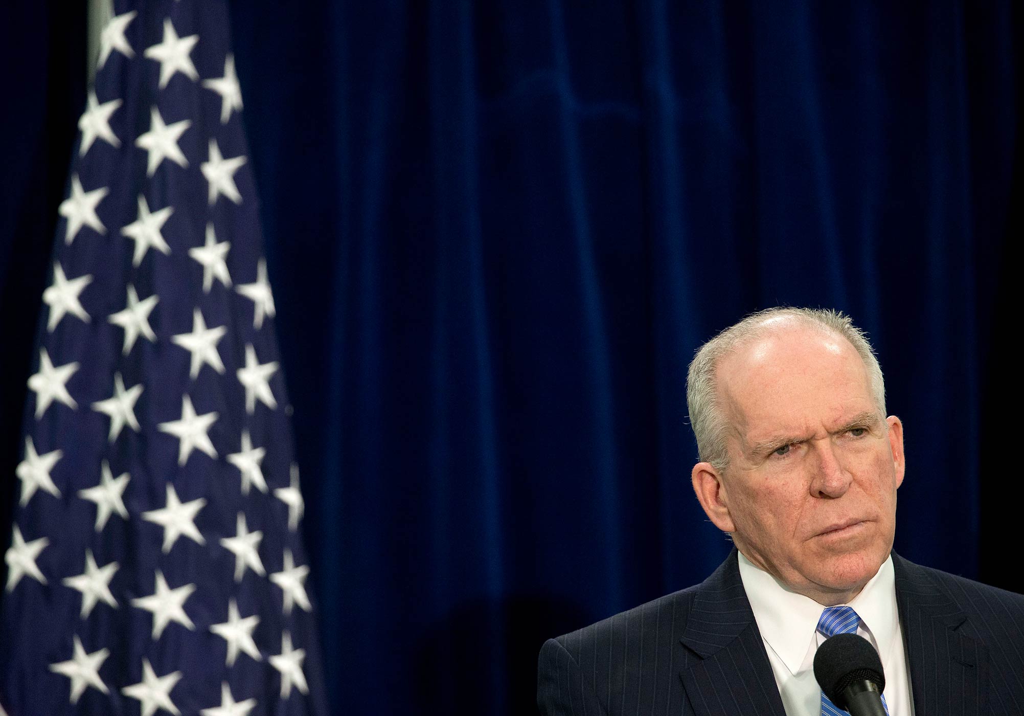 CIA Director John Brennan attends a news conference at CIA headquarters in Langley, Va., on Dec. 11, 2014. (Pablo Martinez Monsivais—AP)