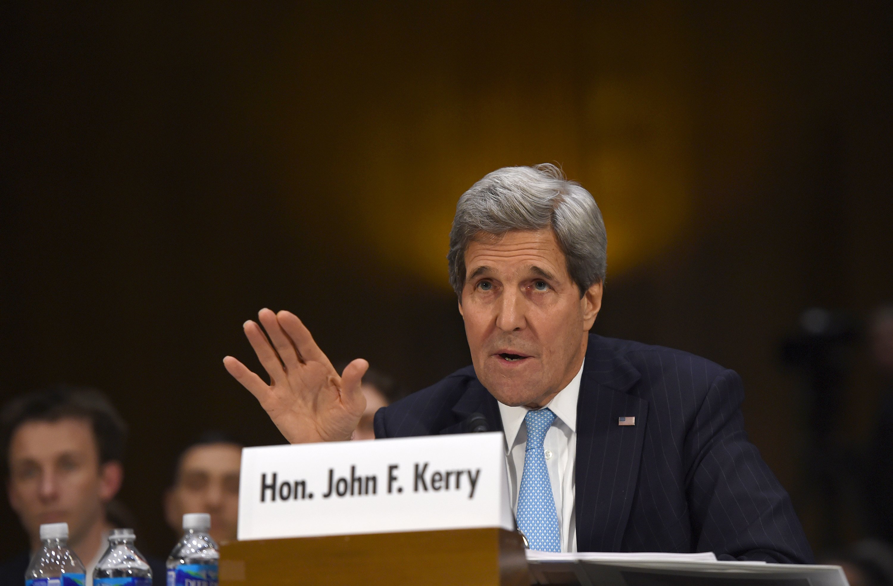 Secretary of State John Kerry testifies on Capitol Hill in Washington on Dec. 9, 2014, before the Senate Foreign Relations hearing on "Authorization for the Use of Military Force Against IS." (Molly Riley—AP)