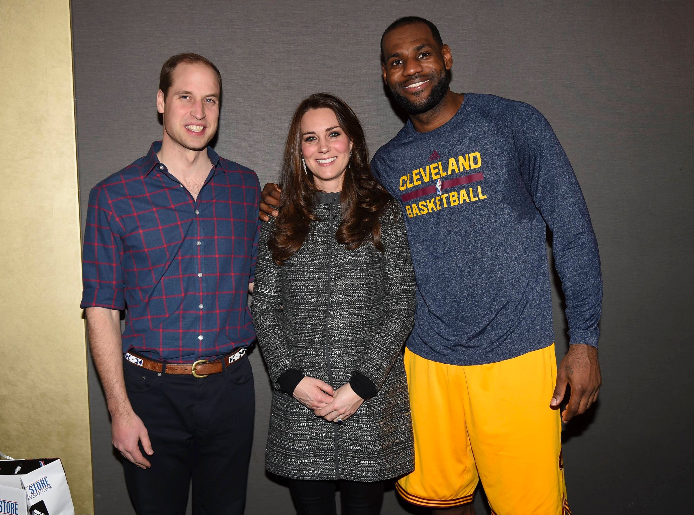 Catherine Duchess of Cambridge and Prince William with Lebron James at the Brooklyn Nets vs. Cleveland Cavaliers, NBA Basketball game on Dec. 8, 2014 in New York.