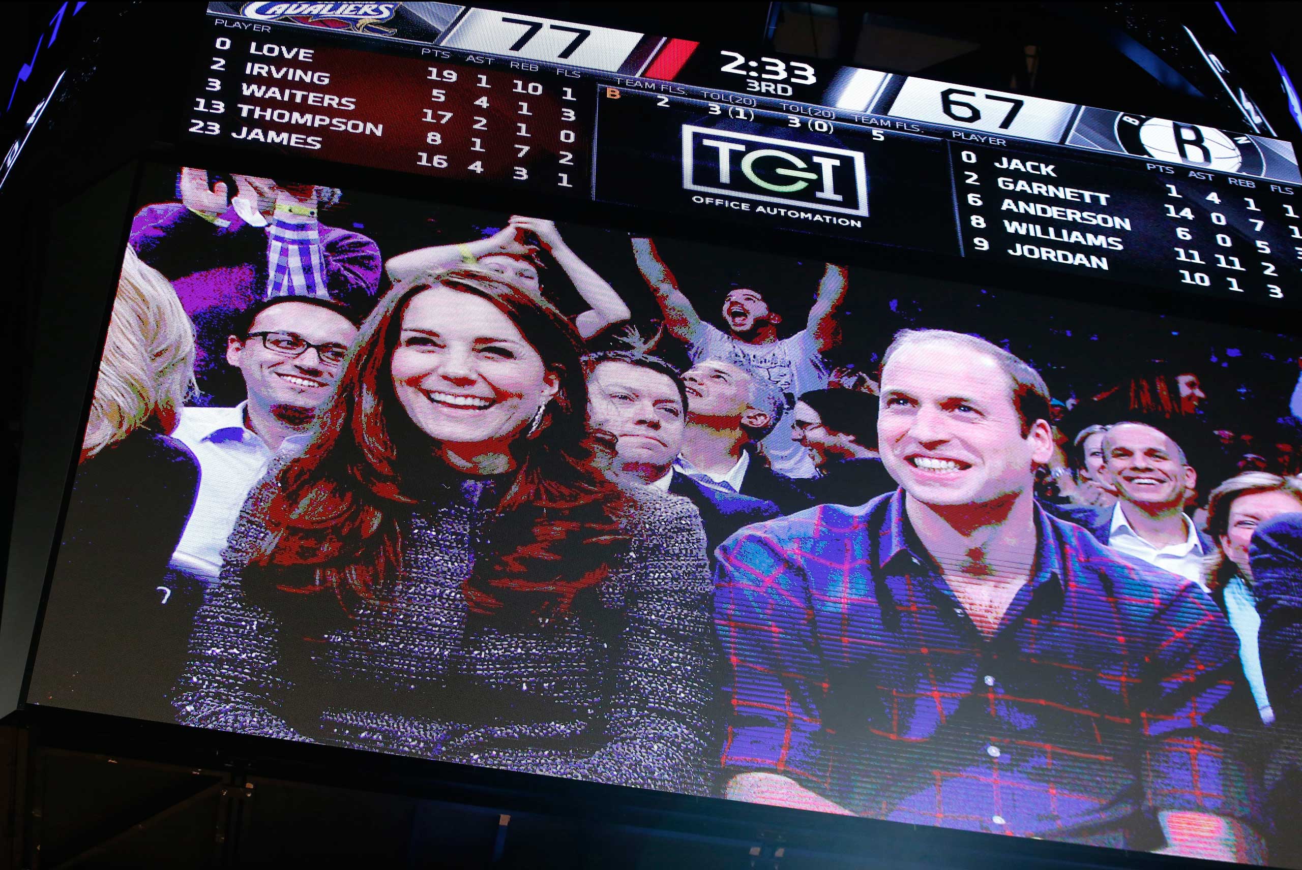 Prince William and Catherine, the Duke and Duchess of Cambridge are displayed on the Jumbotron during the basketball game between the Cleveland Cavaliers and the Brooklyn Nets at the Barclays Center in Brooklyn on Dec. 8, 2014.