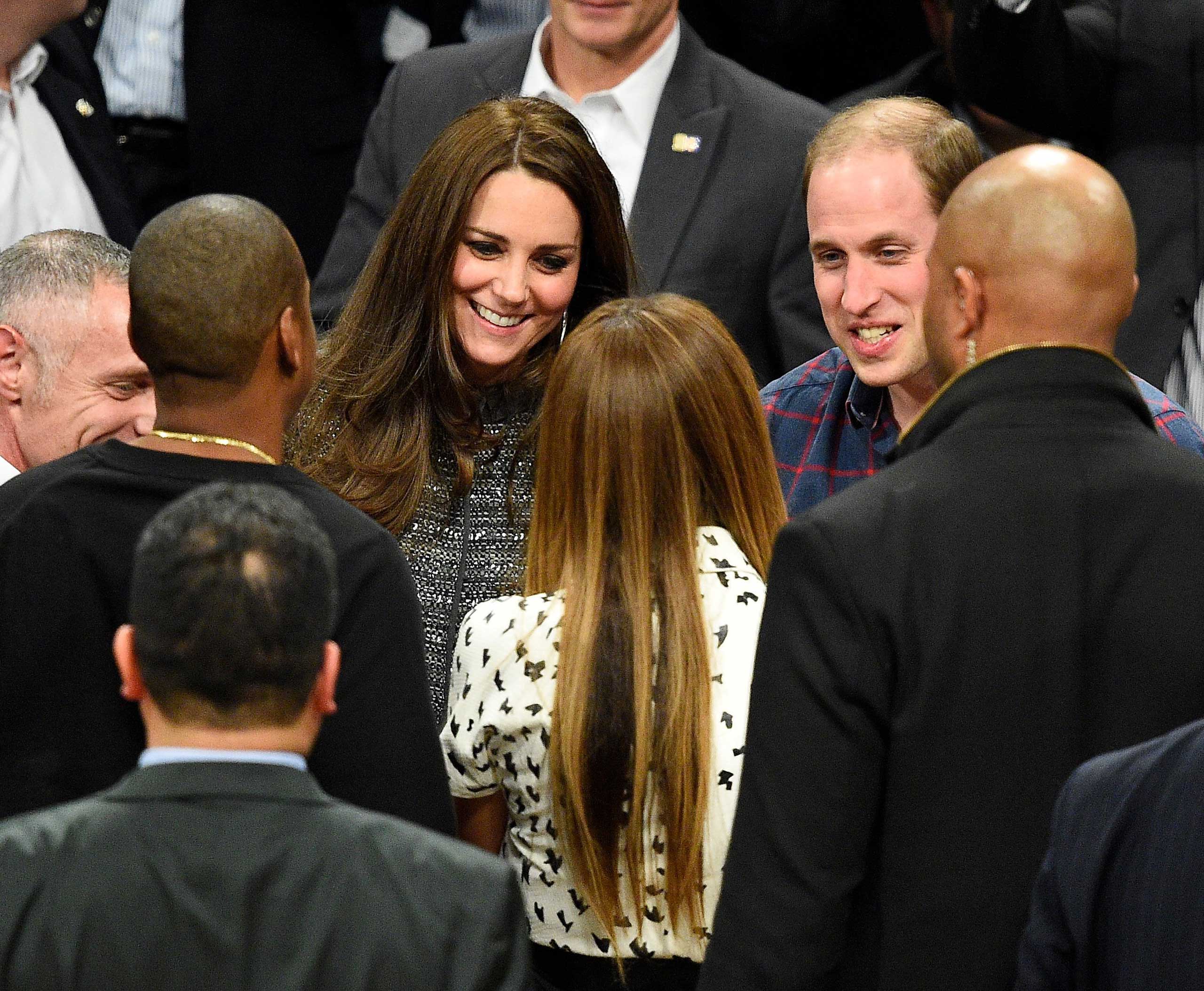 Between the 3rd and 4th quarter of the game, Beyonce and Jay Z approached the royal couple to say hello.