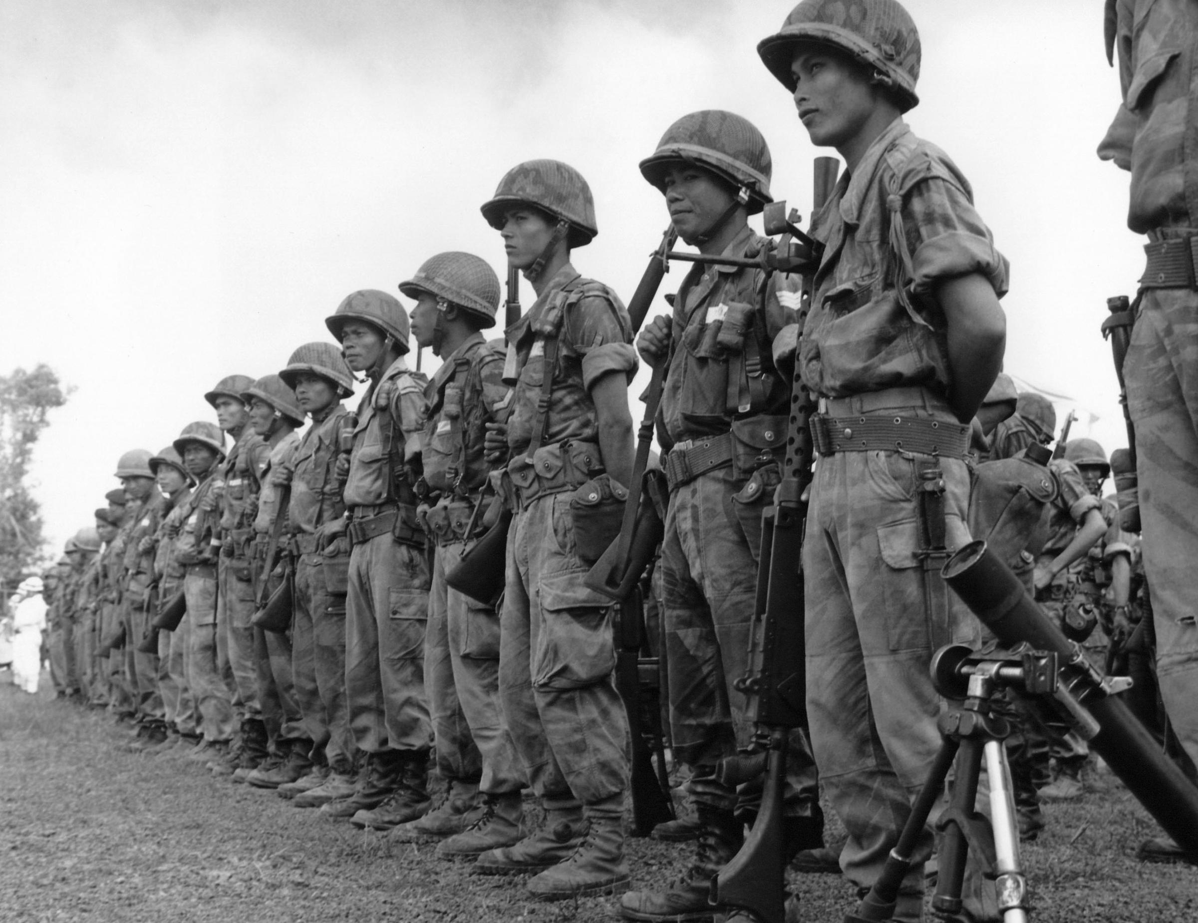 South Vietnamese government troops at Moc Hoa village some 60 miles Southwest of Saigon after a second major victory over Viet Cong rebels on Aug. 24, 1961.
