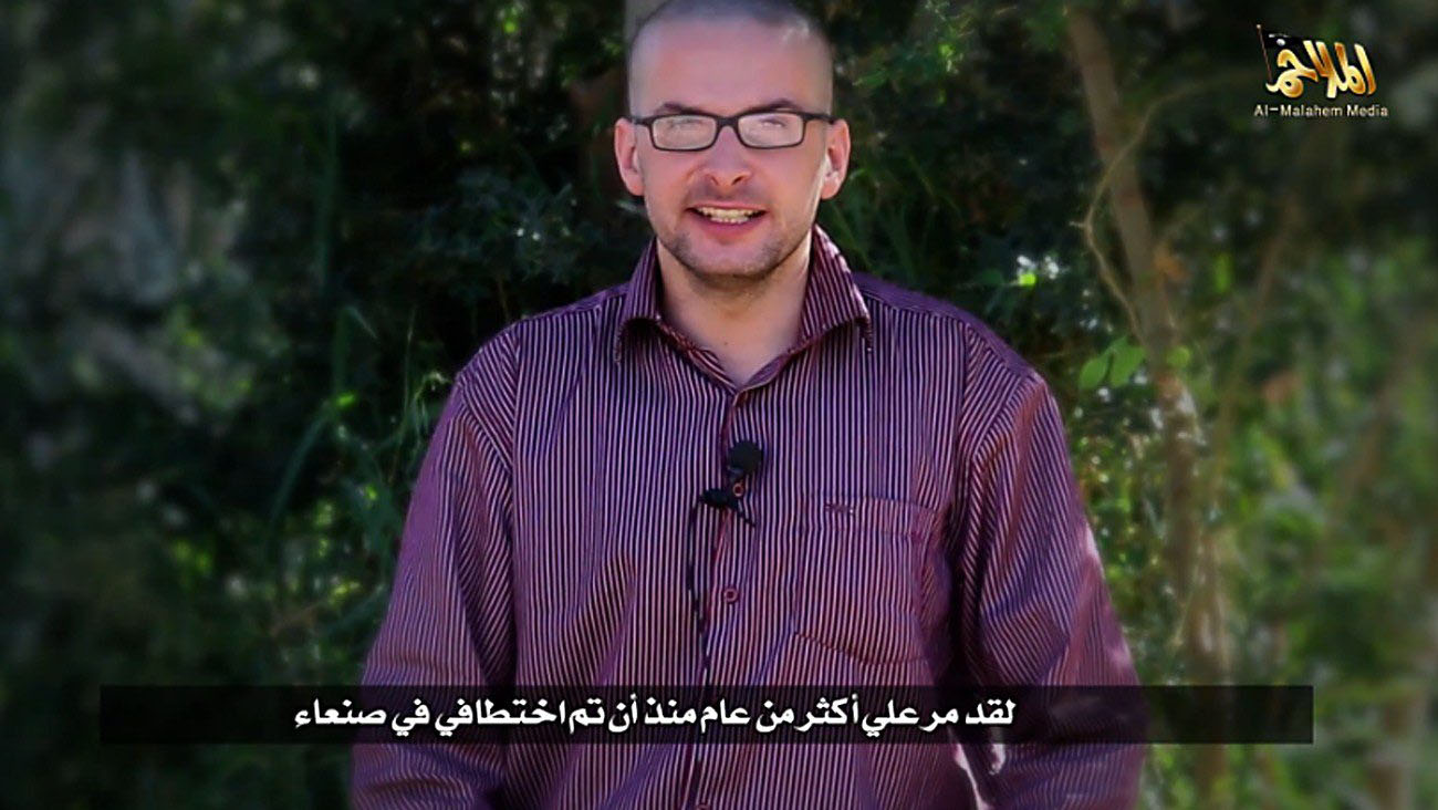 A video grab taken from a propaganda video released by al-Malahem Media on Dec. 4, 2014 purportedly shows hostage Luke Somers, 33, kidnapped more than a year ago in the Yemeni capital Sanaa, calling for help and saying that his life is in danger. (AFP/Getty Images)