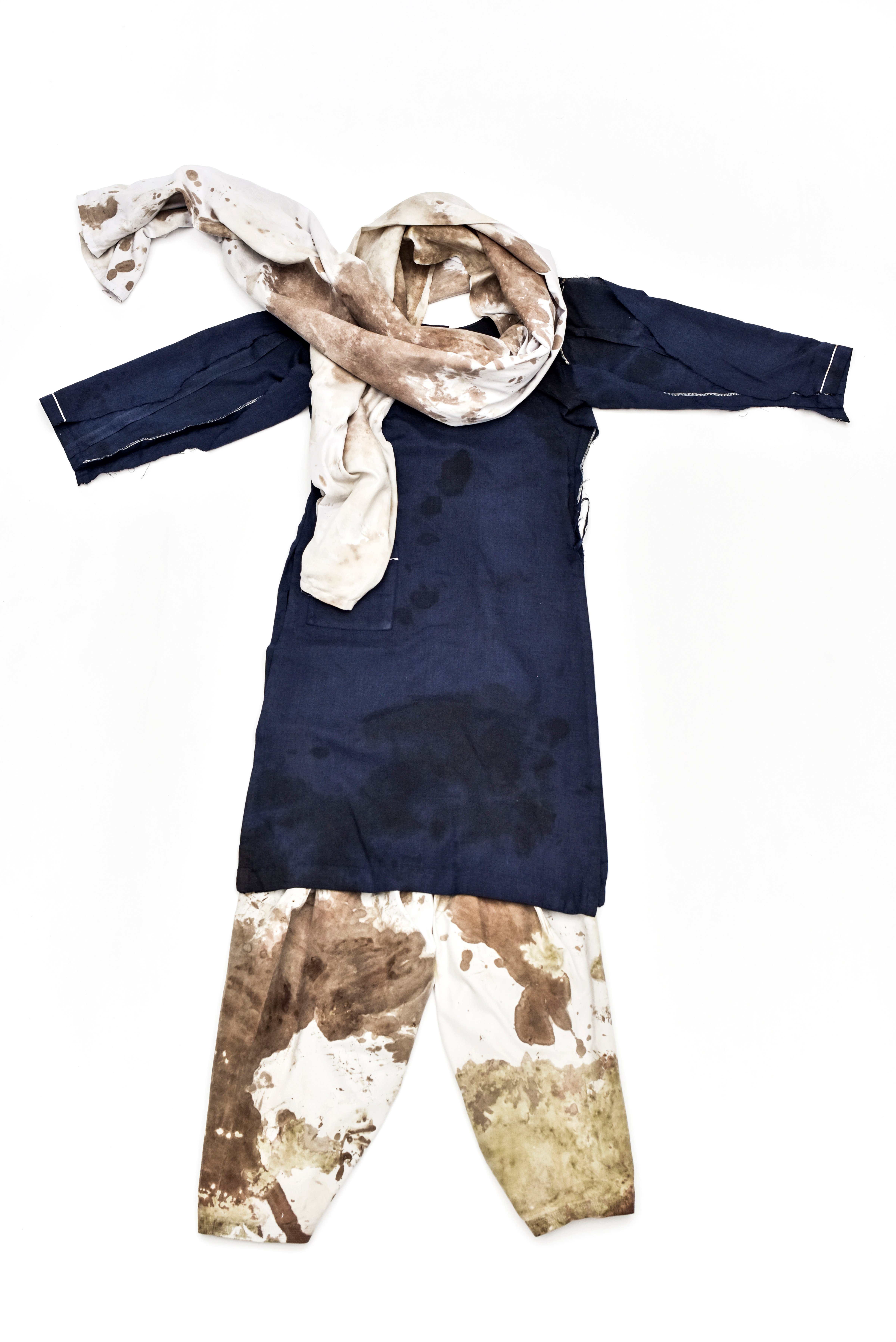 The school uniform of Malala Yousafzai, Nobel Peace Prize laureate 2014. Malala was wearing the uniform on the day she was shot in the head by the Taliban while on the school bus in Swat, Pakistan, on Oct. 2012. (Lynsey Addario—Reportage by Getty Images for the Nobel Peace Center)