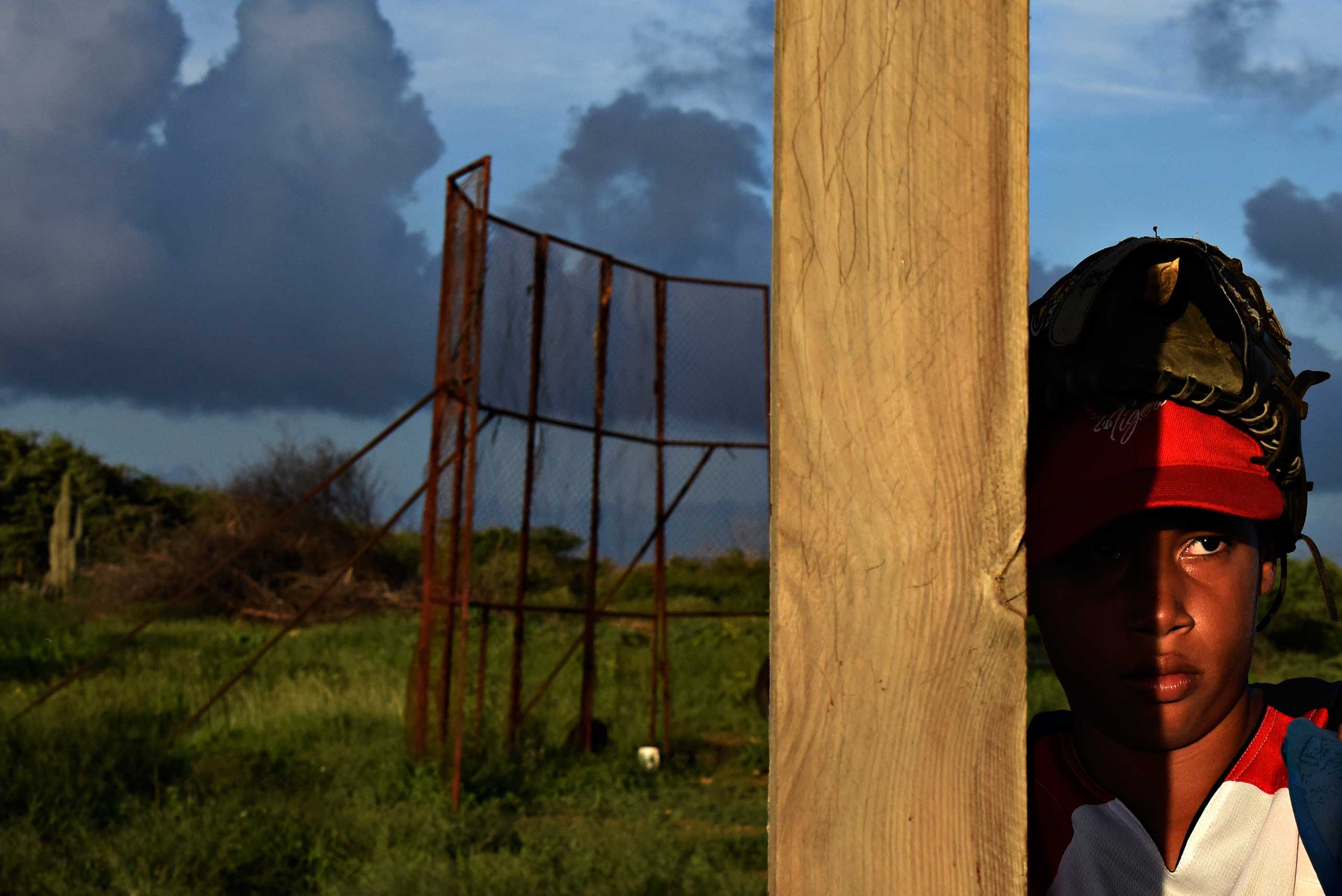 The New York Times: An Unlikely Source of Big TalentA boy on a baseball field in Tera Kora, Curacao, Dec. 10, 2014. Despite —or perhaps because of—the rough fields, the tiny island near Venezuela has become a source for numerous major league baseball stars.