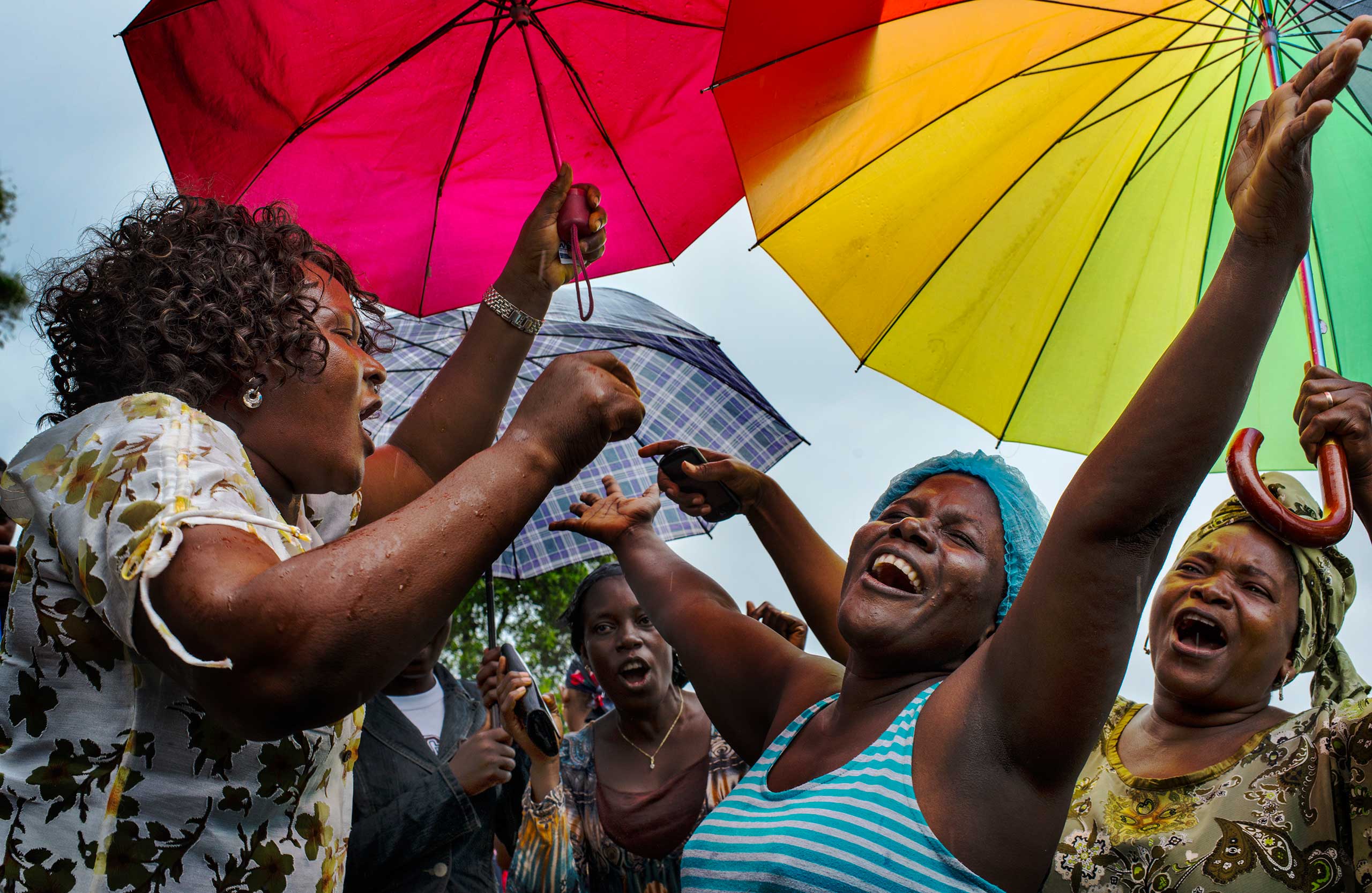 The New York Times Lens: Michel du Cille: A Photographer With Compassion and RespectKlubo Mulbah, a nurse who was infected with Ebola celebrates her recovery, Sept. 24, 2014 in Monrovia, Liberia.
